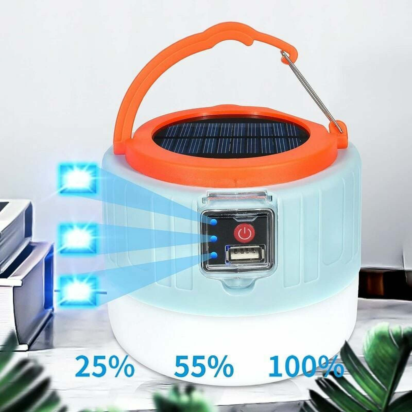 Solar-Laterne mit orangefarbenem Griff, USB-Anschluss und Ladeanzeige.