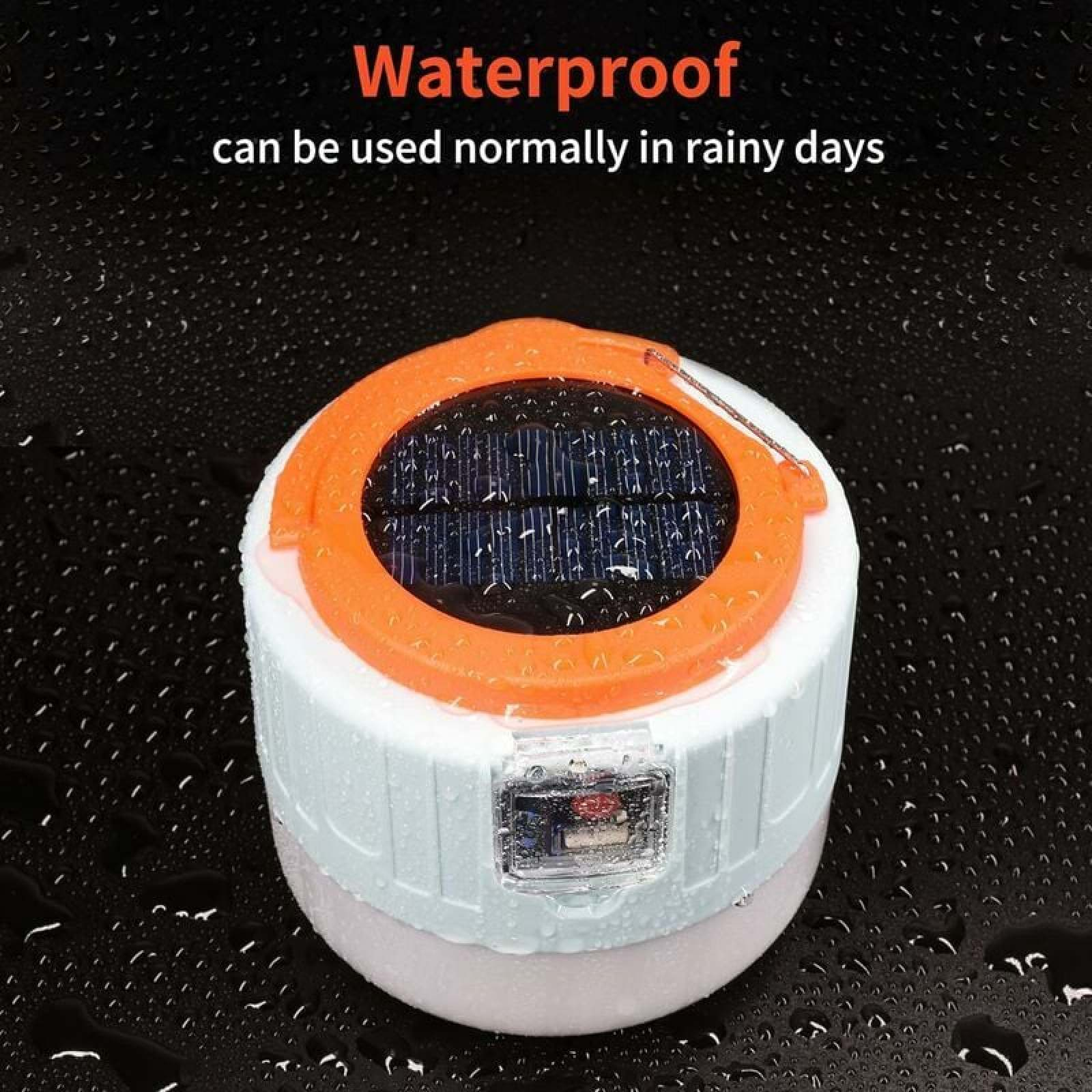 Eine weiße und orangefarbene Solar-Laterne mit Wasser auf schwarzem Hintergrund.