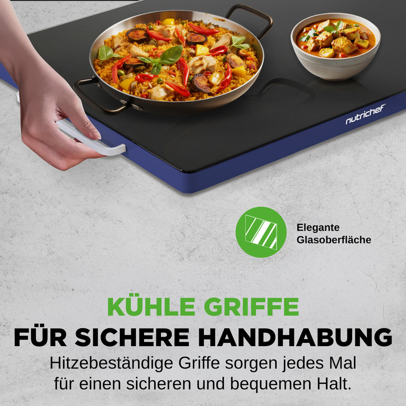 Ein Kochfeld mit Paella und Curry, eine Hand greift einen Griff.