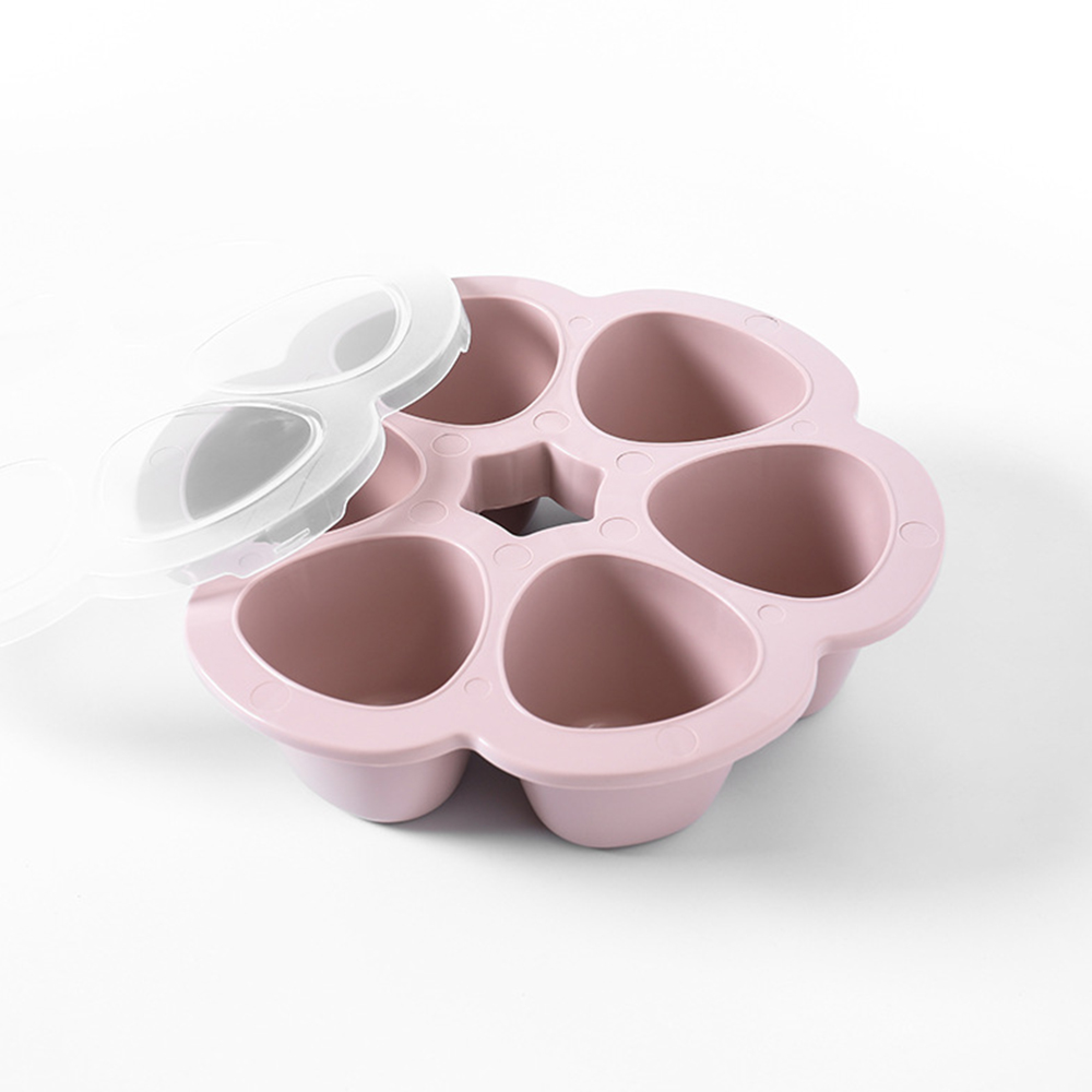 Eine rosa Silikonform mit sechs Mulden und einem durchsichtigen Deckel.