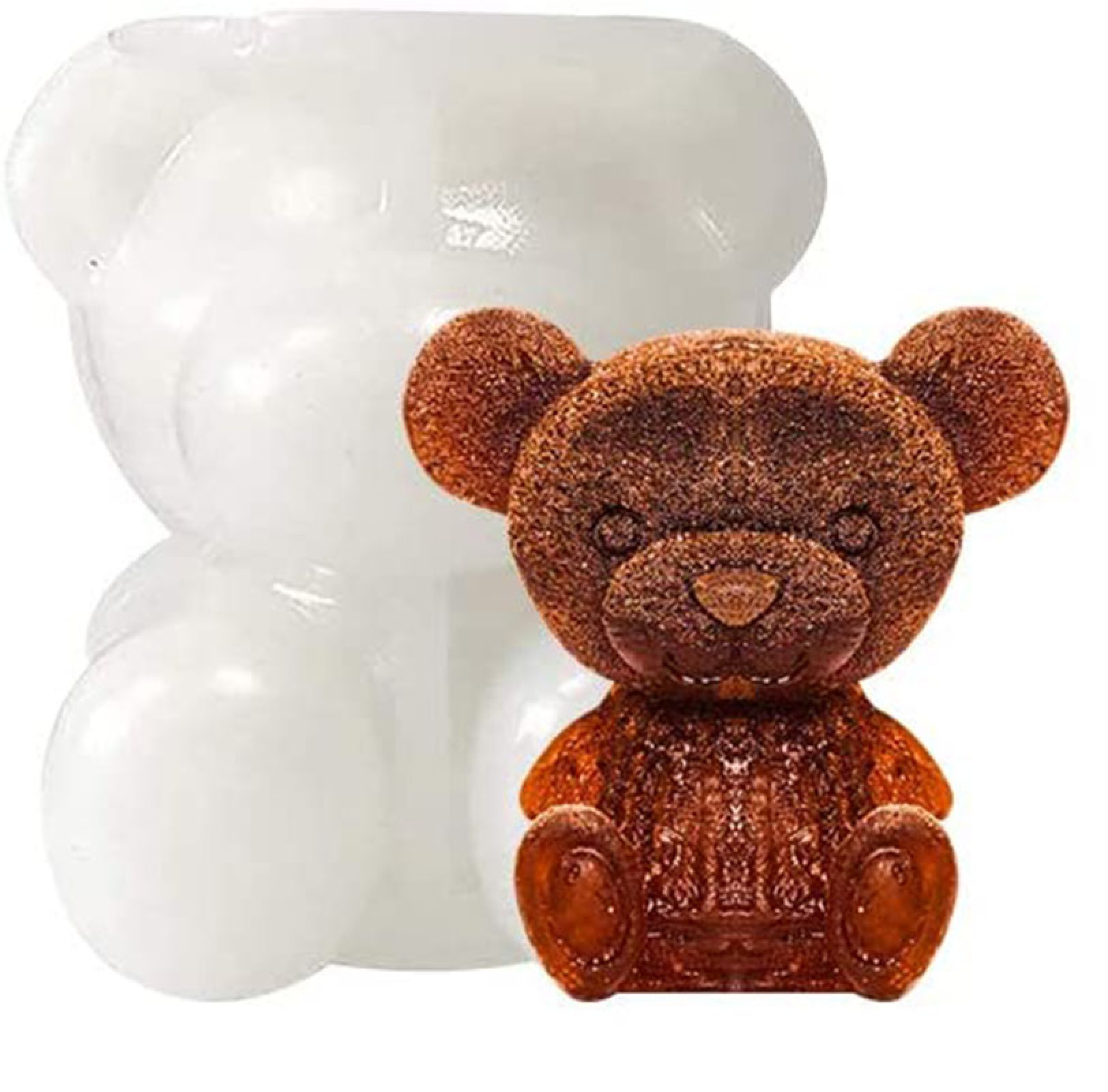 Ein brauner Teddybär-Schokoladenkeks neben einer weißen Teddybär-Form.