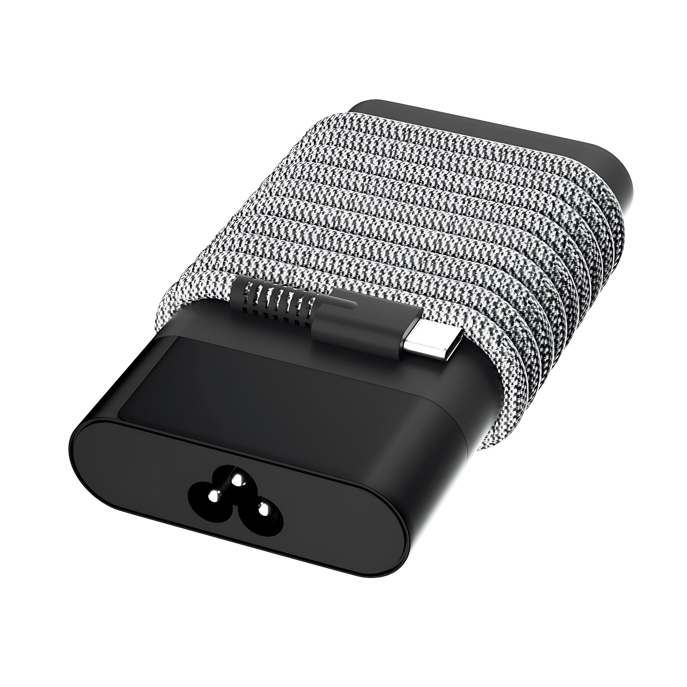 Zwarte laptop-voedingsadapter met opgerold snoer en USB-C-connector.