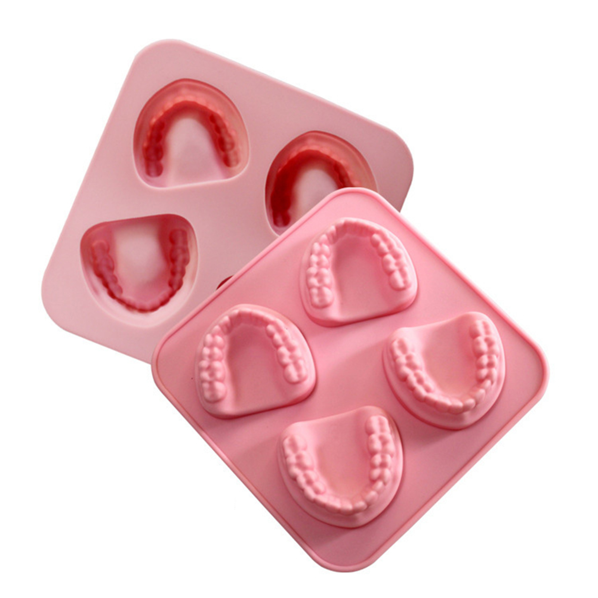 Zwei rosa Silikonformen mit Zahnformen, eine mit roter Füllung.