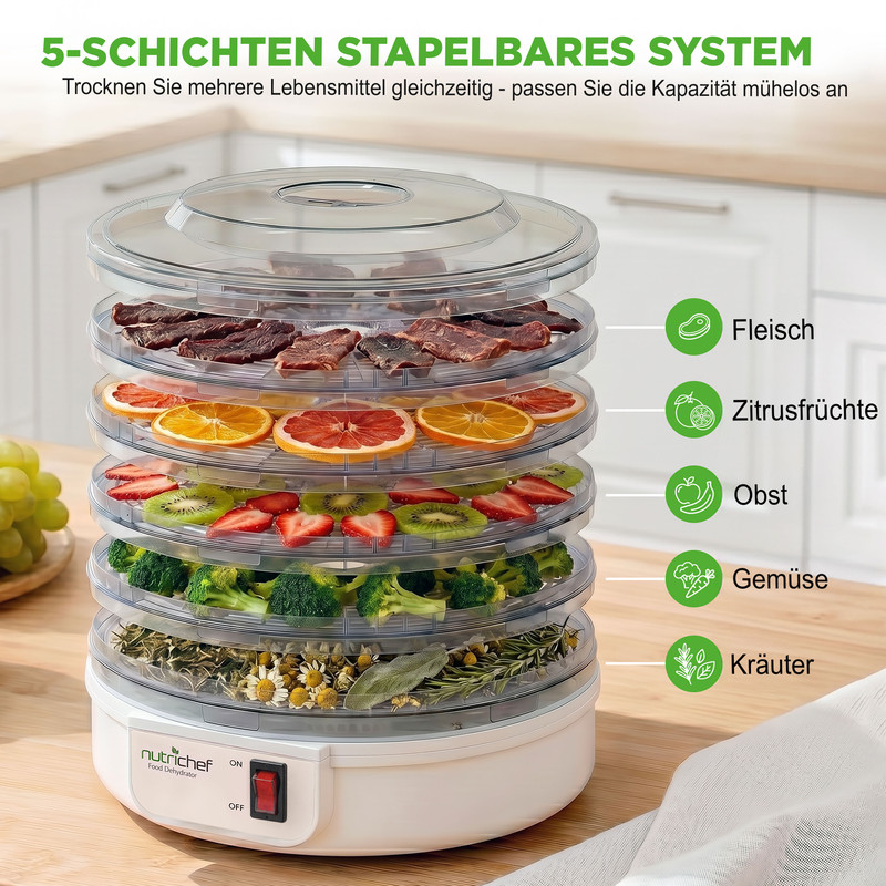 5-schichtiger Dörrautomat mit Fleisch, Zitrusfrüchten, Obst, Gemüse, Kräutern.