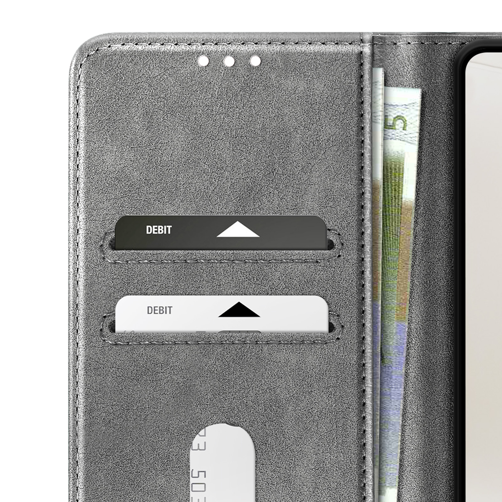 Graues Portemonnaie mit zwei Kartenschlitzen, einer Banknote und einem Telefon.