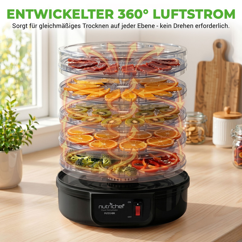 Ein runder Dörrautomat mit fünf Ebenen, gefüllt mit Obst und Gemüse. Luftstrompfeile zeigen die Zirkulation.