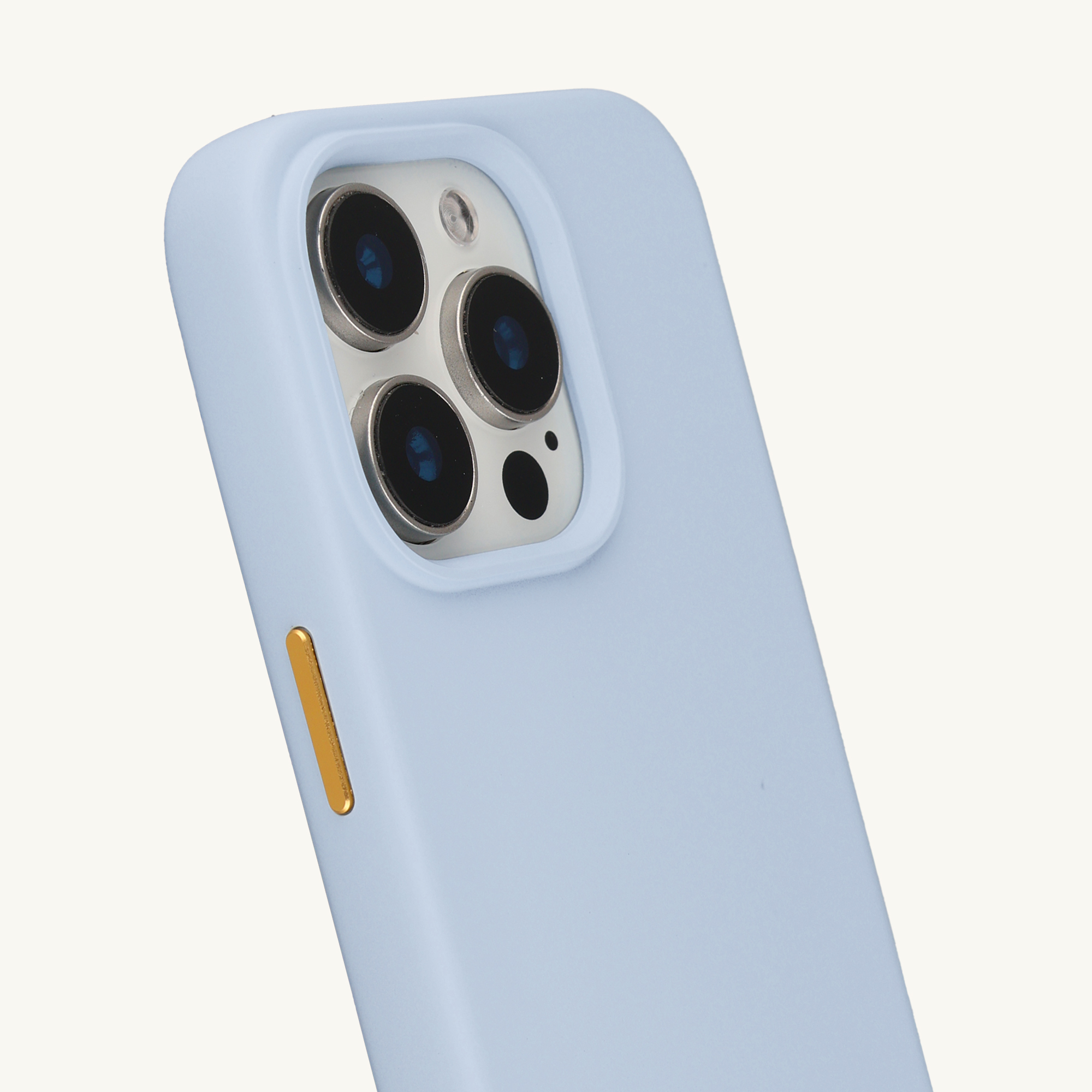 Coque de téléphone bleu clair avec bloc caméra et bouton doré.