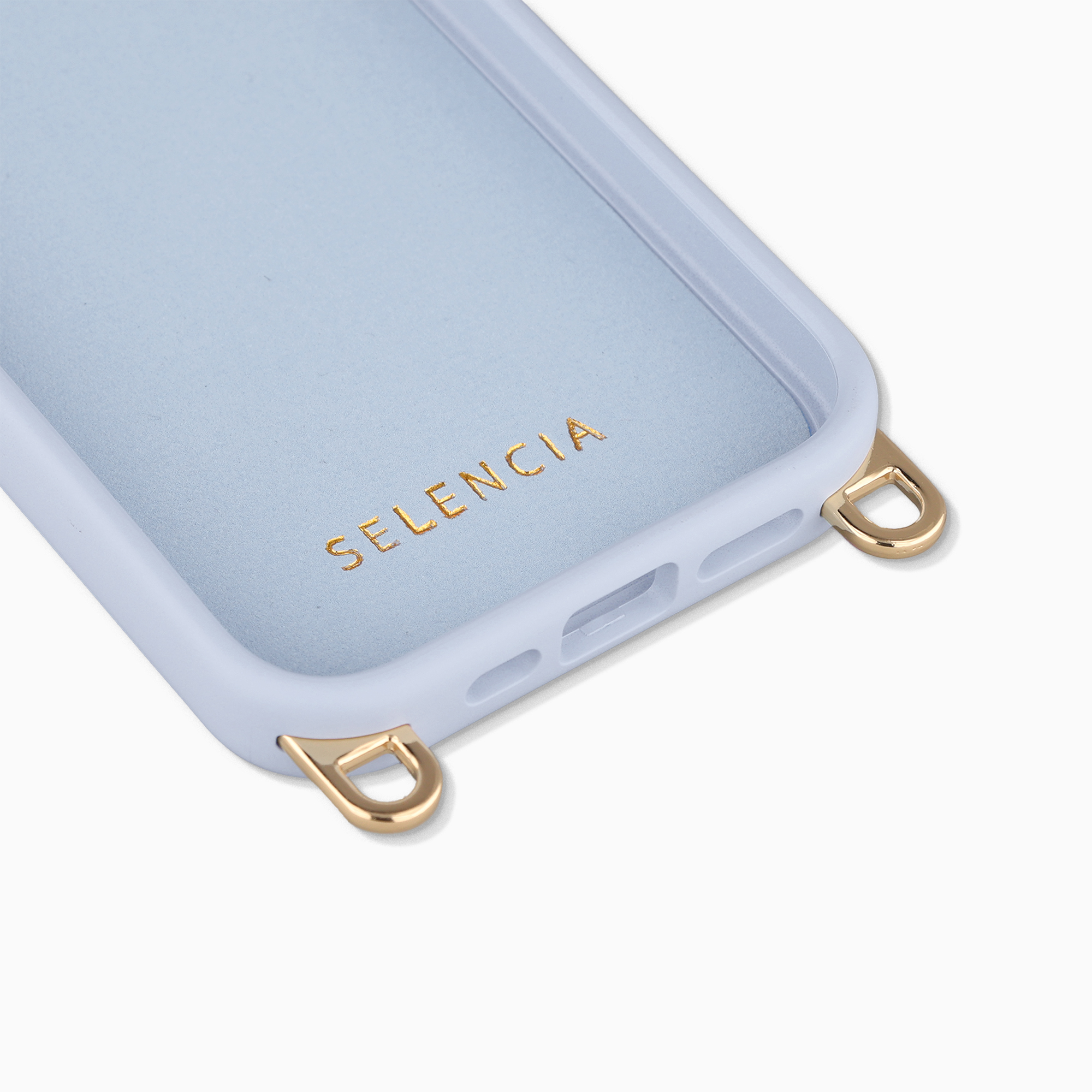 Coque de téléphone bleu clair avec œillets dorés et texte "SELENCIA".