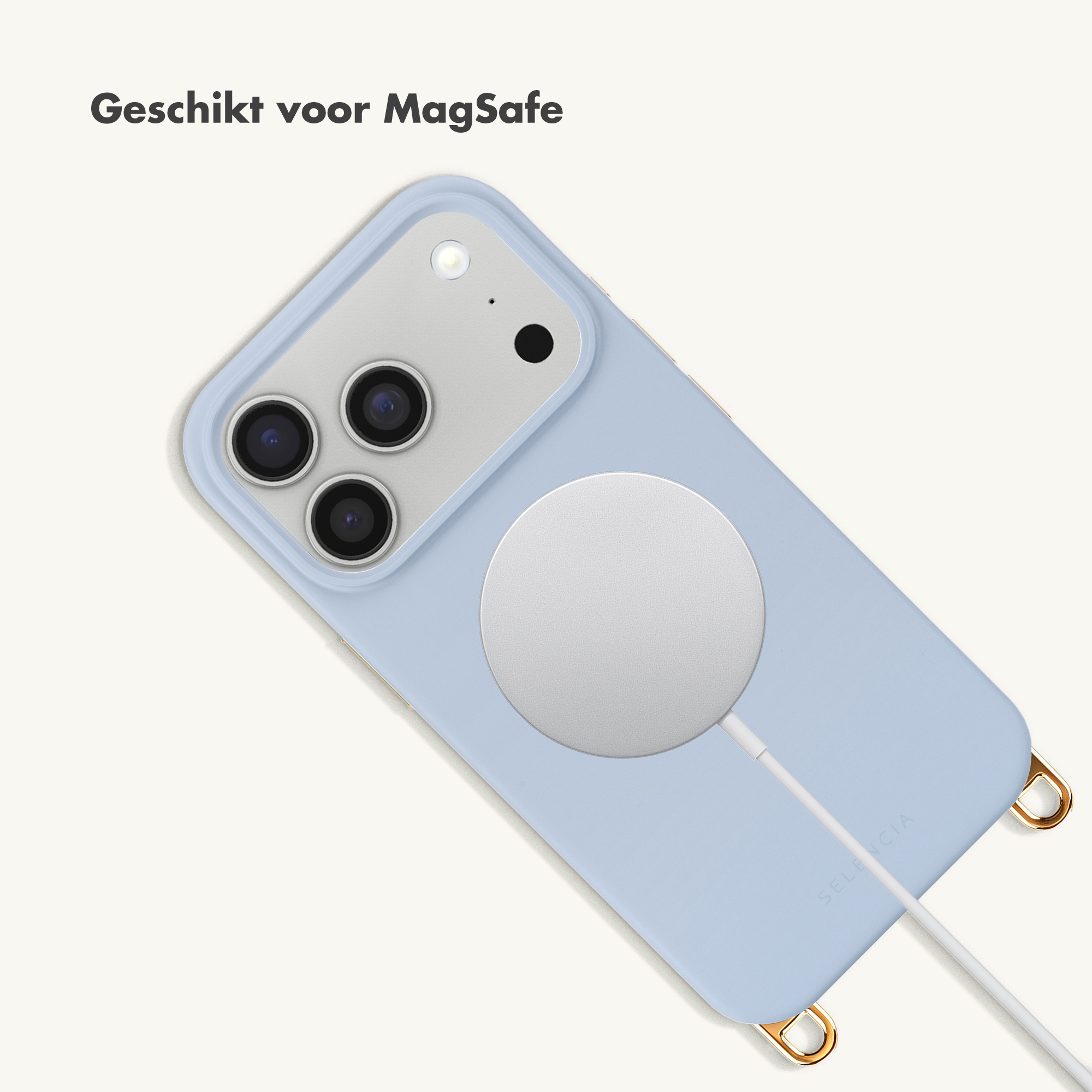 Een blauwe iPhone met MagSafe-oplader en zilveren oogjes.