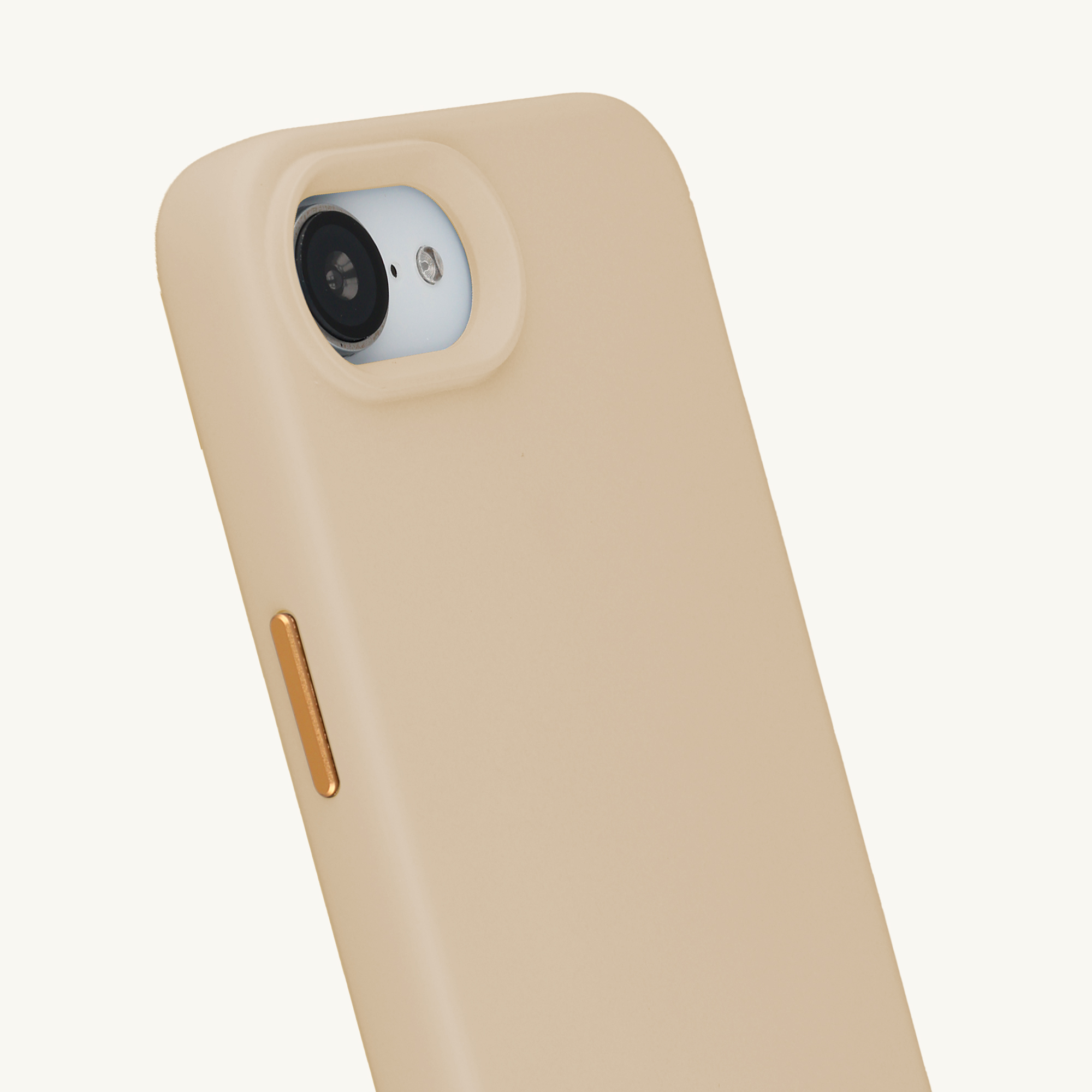 Une coque de téléphone beige avec un gros plan de la caméra et un bouton.