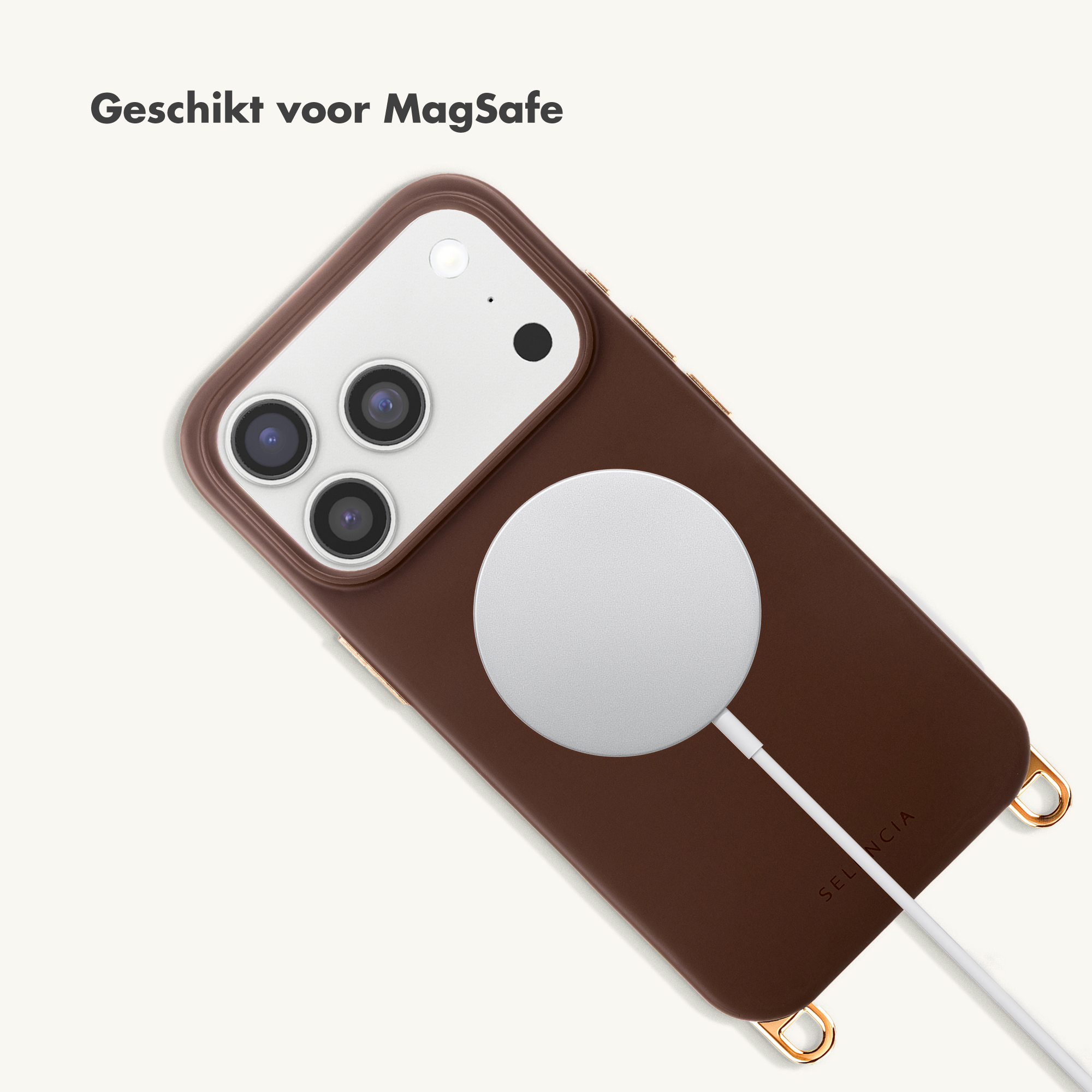 Bruine iPhone met MagSafe lader en koordbevestigingen.