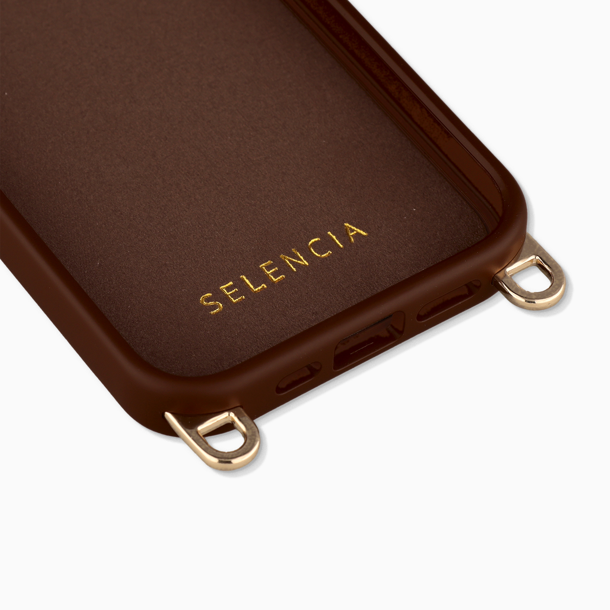 Coque de téléphone marron avec lettrage doré SELENCIA et
passants dorés pour lanière.
