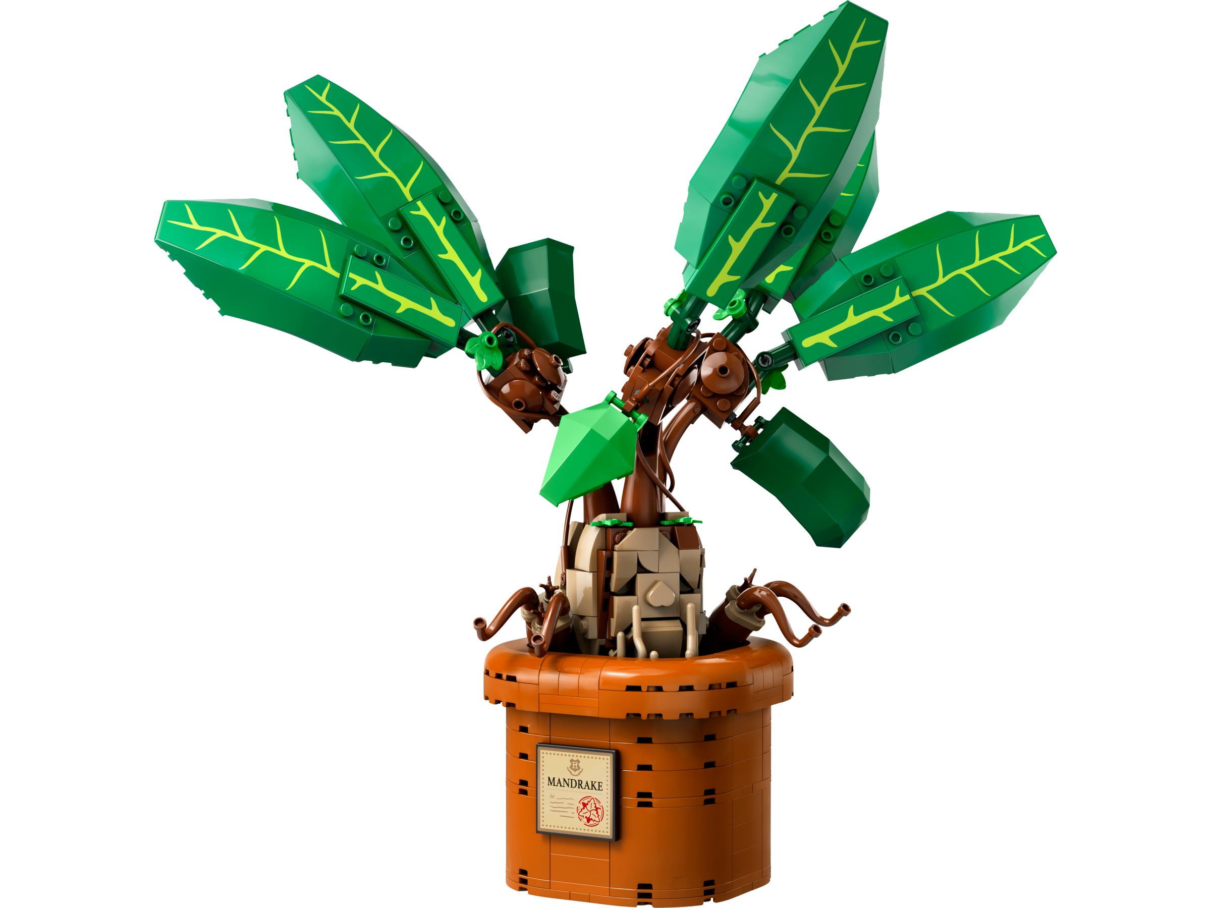 Eine Lego-Mandrake-Pflanze in einem braunen Topf mit grünen Blättern.