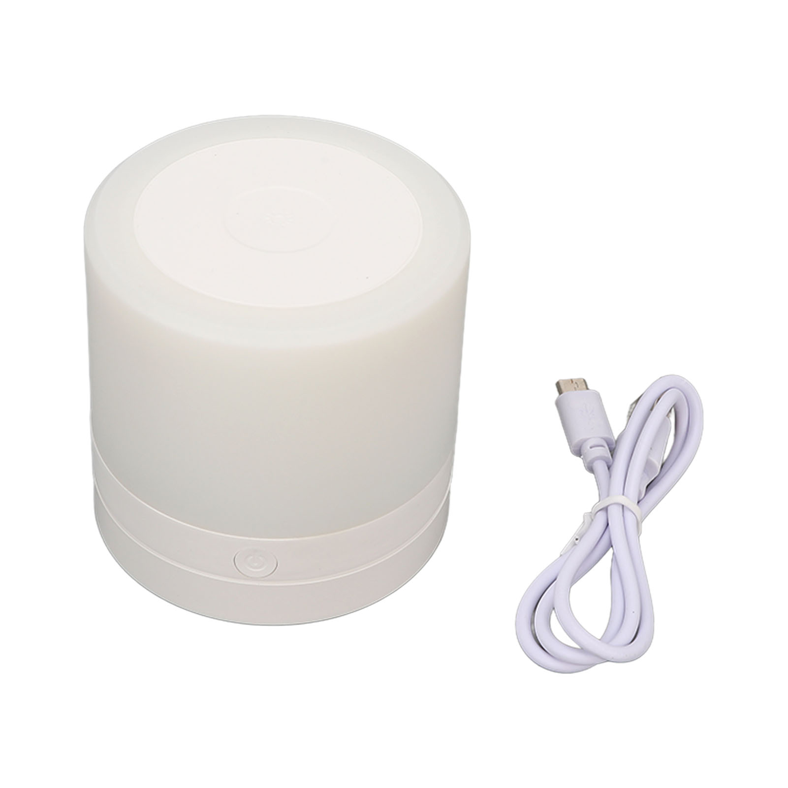 Eine weiße, zylindrische Lampe mit einem USB-Kabel daneben.
