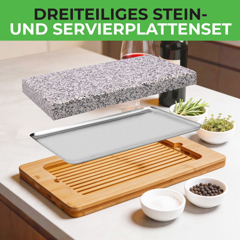 Dreiteiliges Servierplatten-Set: Granitplatte, Metallschale, Holzbrett mit Rillen.