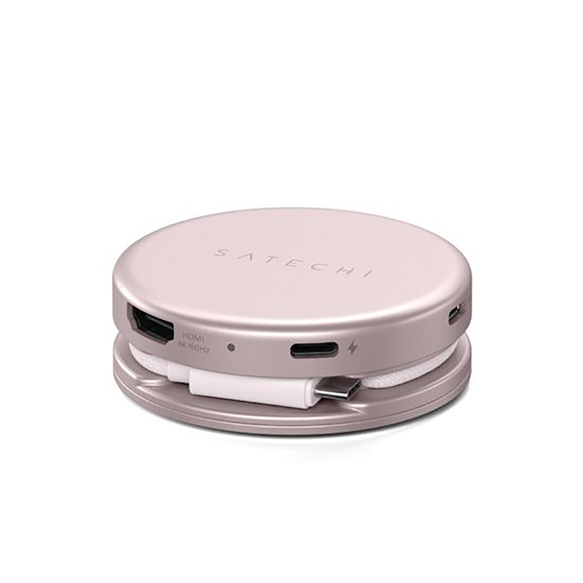 Różowozłoty hub Satechi USB-C z portami HDMI, USB-C i kablem ładującym.