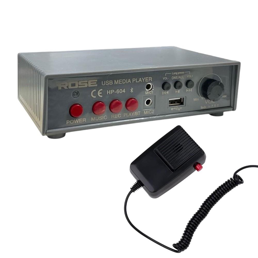 Mikrofonlu gri USB medya oynatıcı. Düğmeler: Power, Music, Rec, Play/BT. Bağlantı noktaları: Mic1, Mic2, USB.