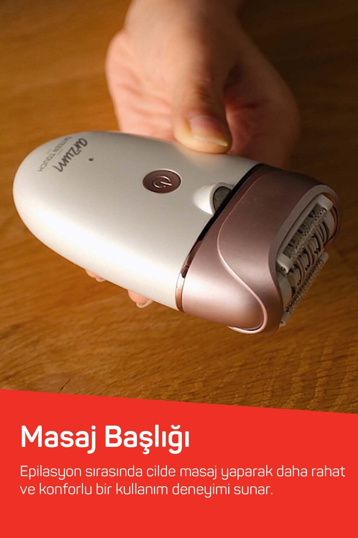 Beyaz ve rose gold epilatör bir el tarafından tutuluyor.