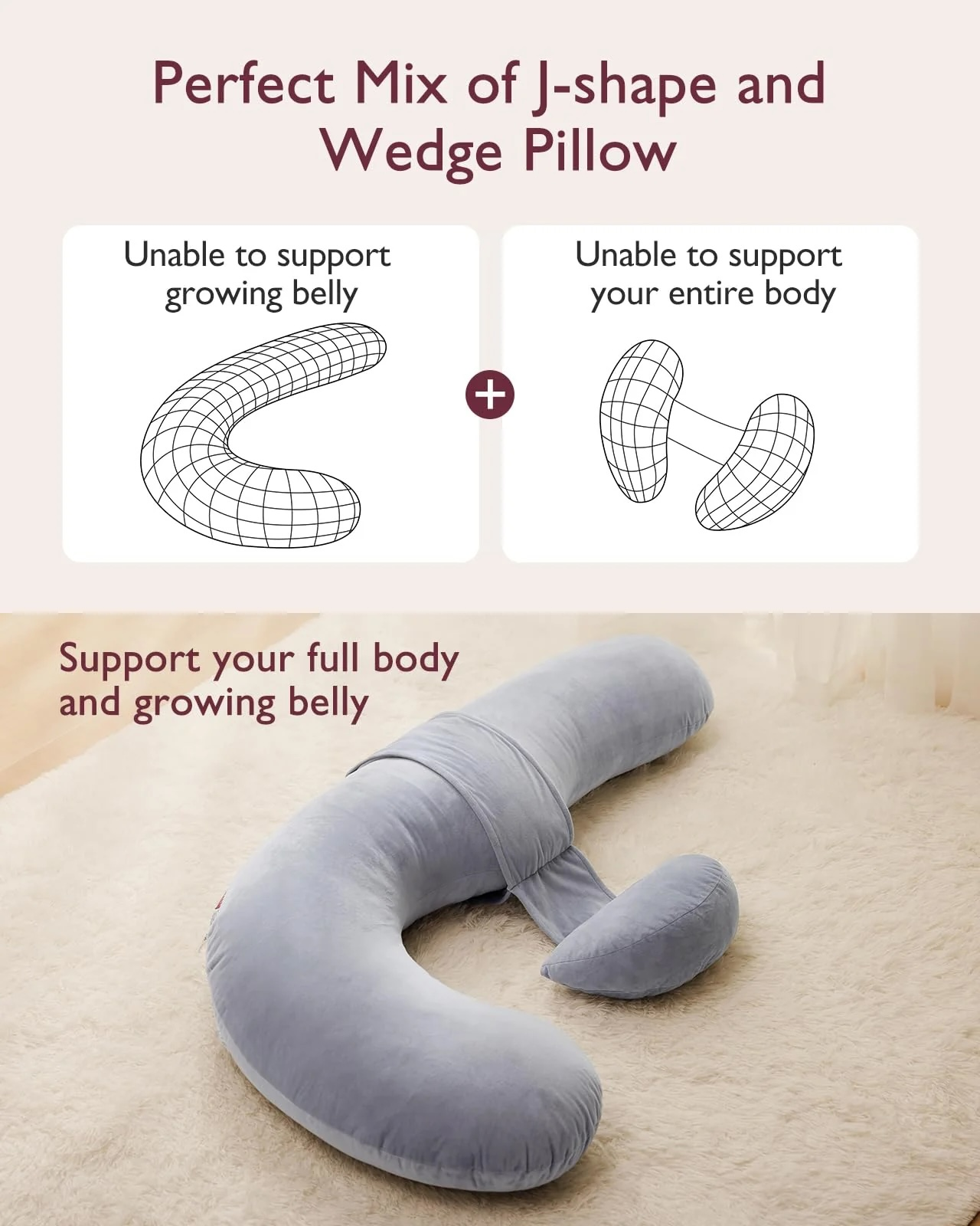 Un coussin de grossesse gris en forme de U repose sur un tapis crème.