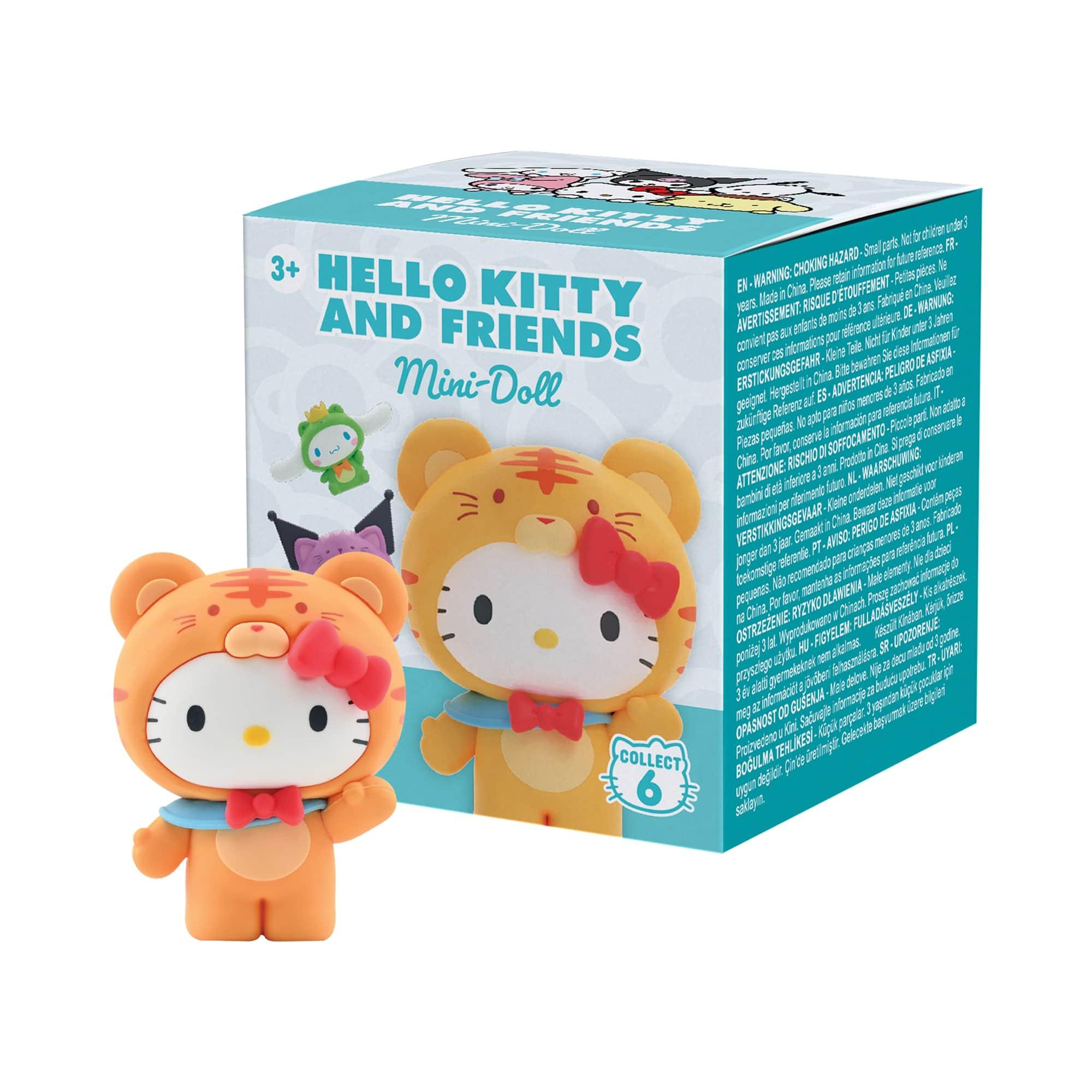 Hello Kitty como figura de tigre con lazos rojos en una caja con advertencias.