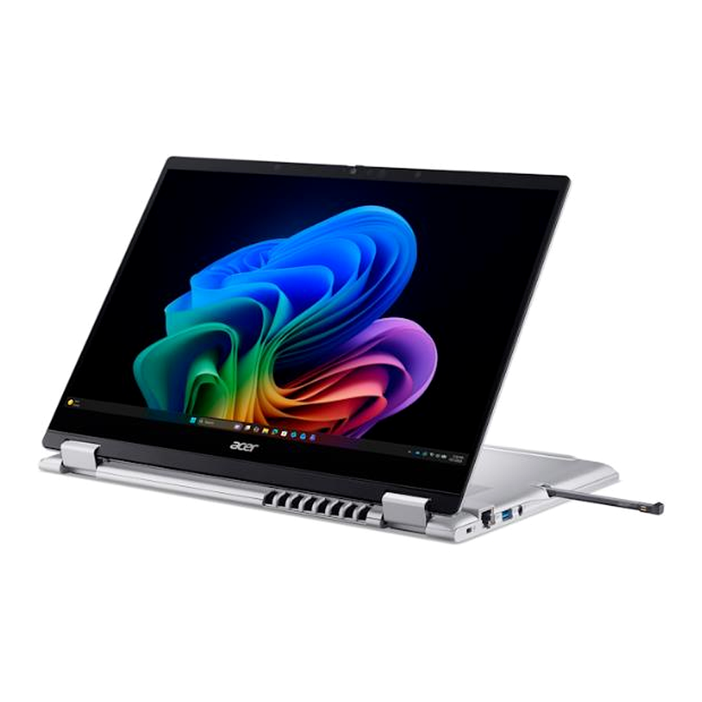 Un laptop Acer argentato con uno sfondo colorato sullo schermo aperto.