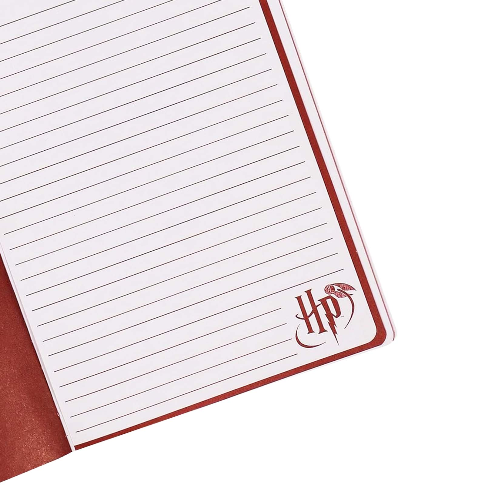 Weißes Notizbuch mit roten Linien und Harry-Potter-Logo.