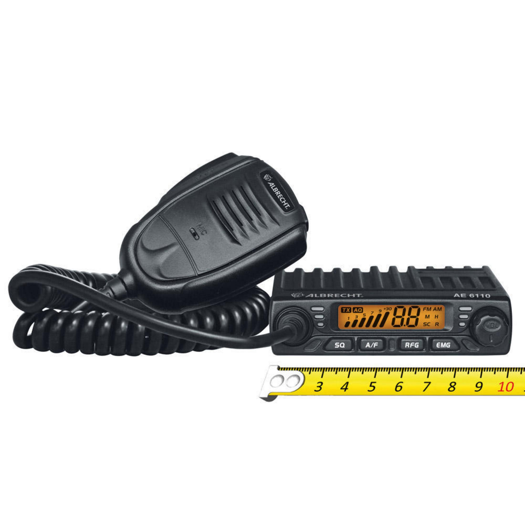Una radio Albrecht AE 6110 con microfono e metro a nastro.