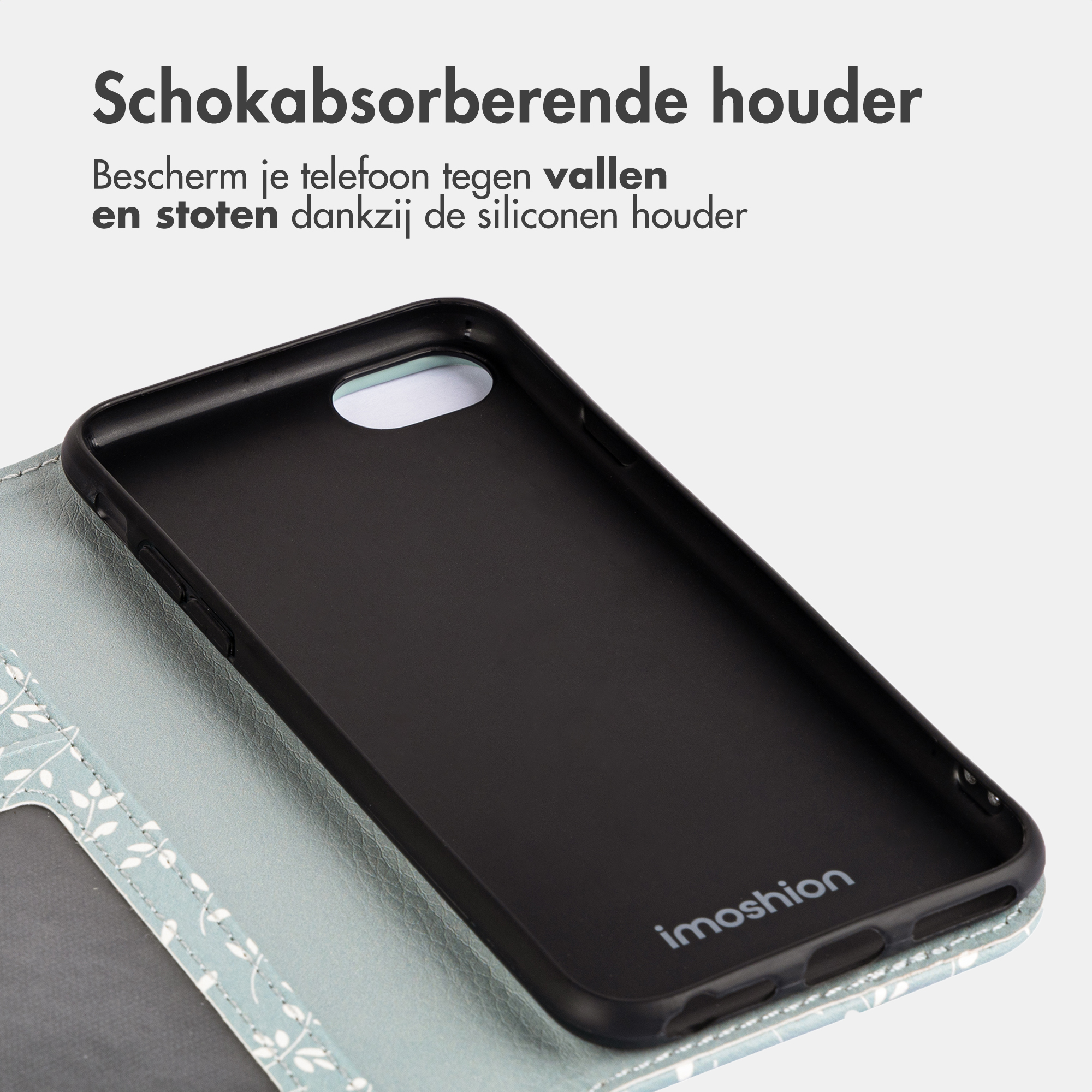 Black phone case with a blue floral cover and Imoshion logo.