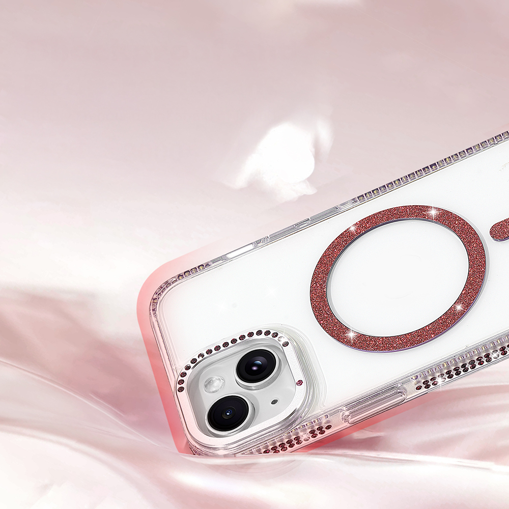 Rose gold simli detaylara sahip şeffaf telefon kılıfı pembe kumaşın üzerinde duruyor.
