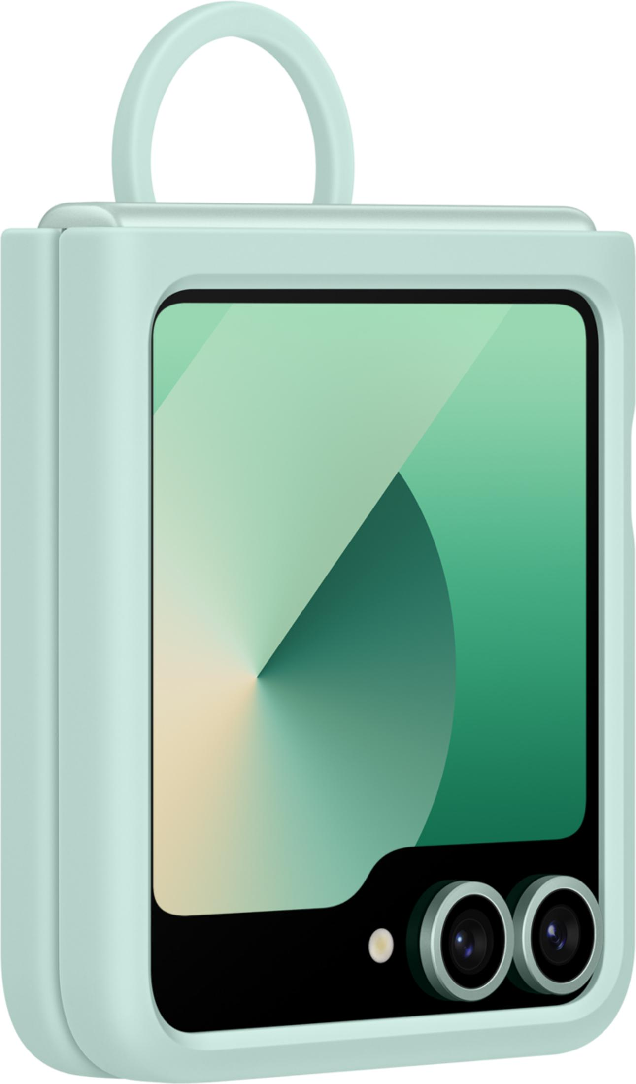 Funda verde claro con cámaras y un aro arriba. Fondo abstracto.