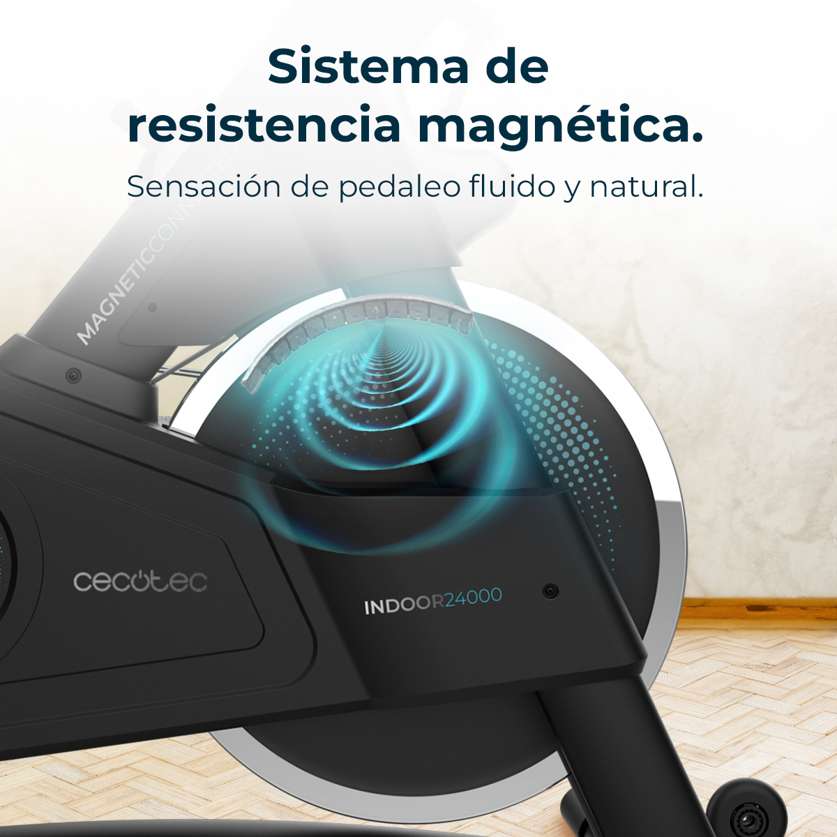 Primer plano de una bicicleta estática negra con sistema de resistencia magnética y remolinos azules.