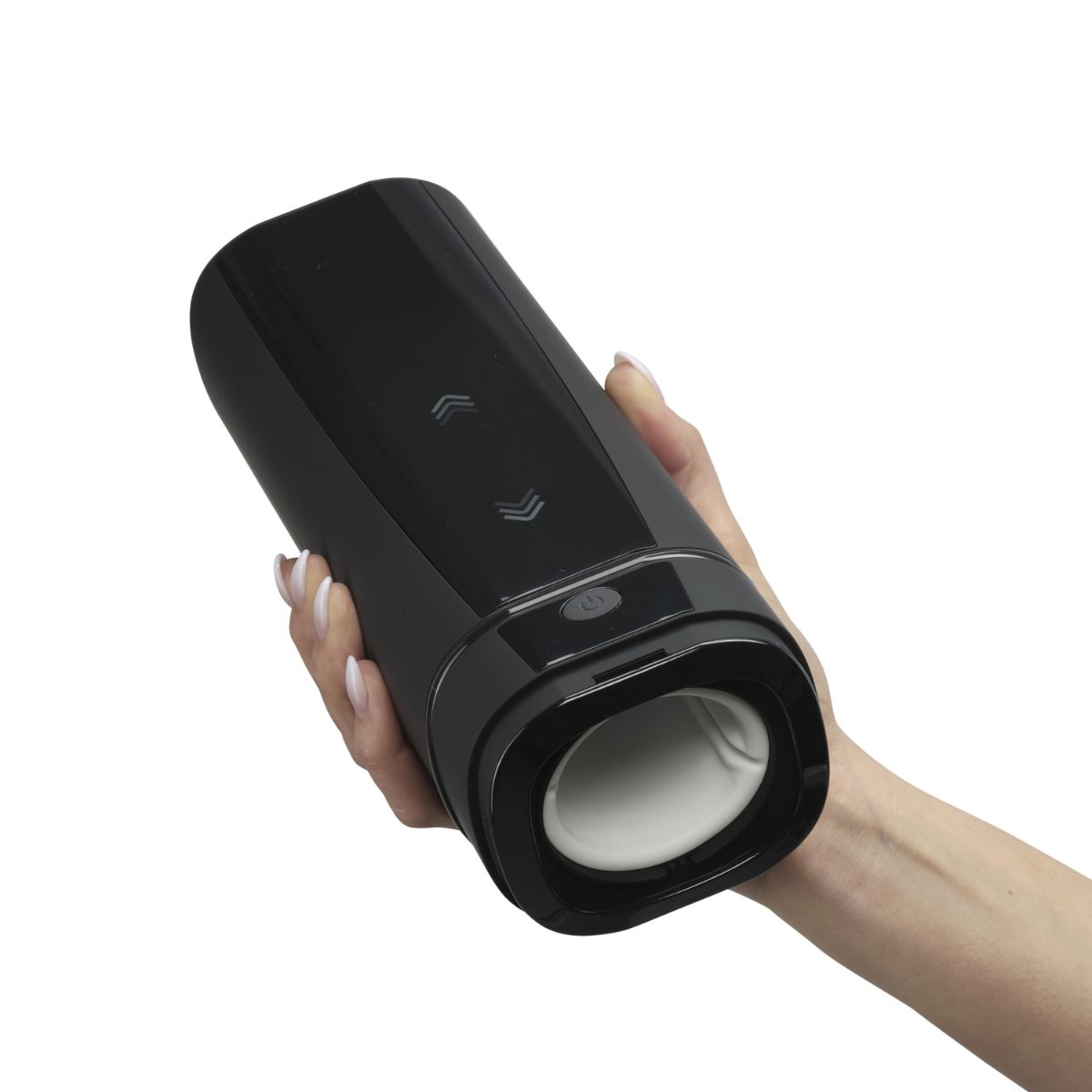 Eine Hand hält einen schwarzen Vibrator mit Pfeilsymbolen und einem Power-Button.
