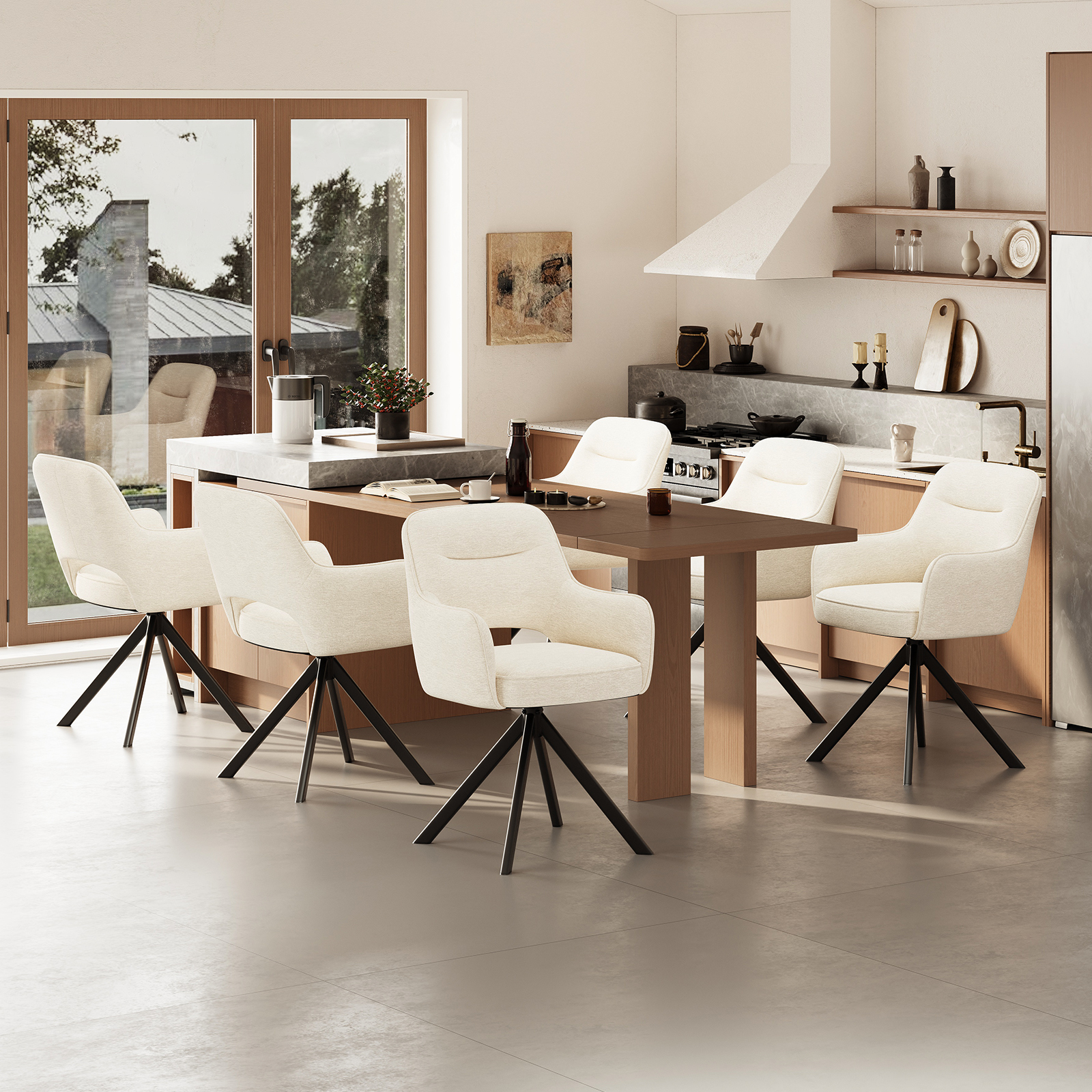 Cucina moderna con zona pranzo; sedie bianche attorno tavolo legno, isola marmo.