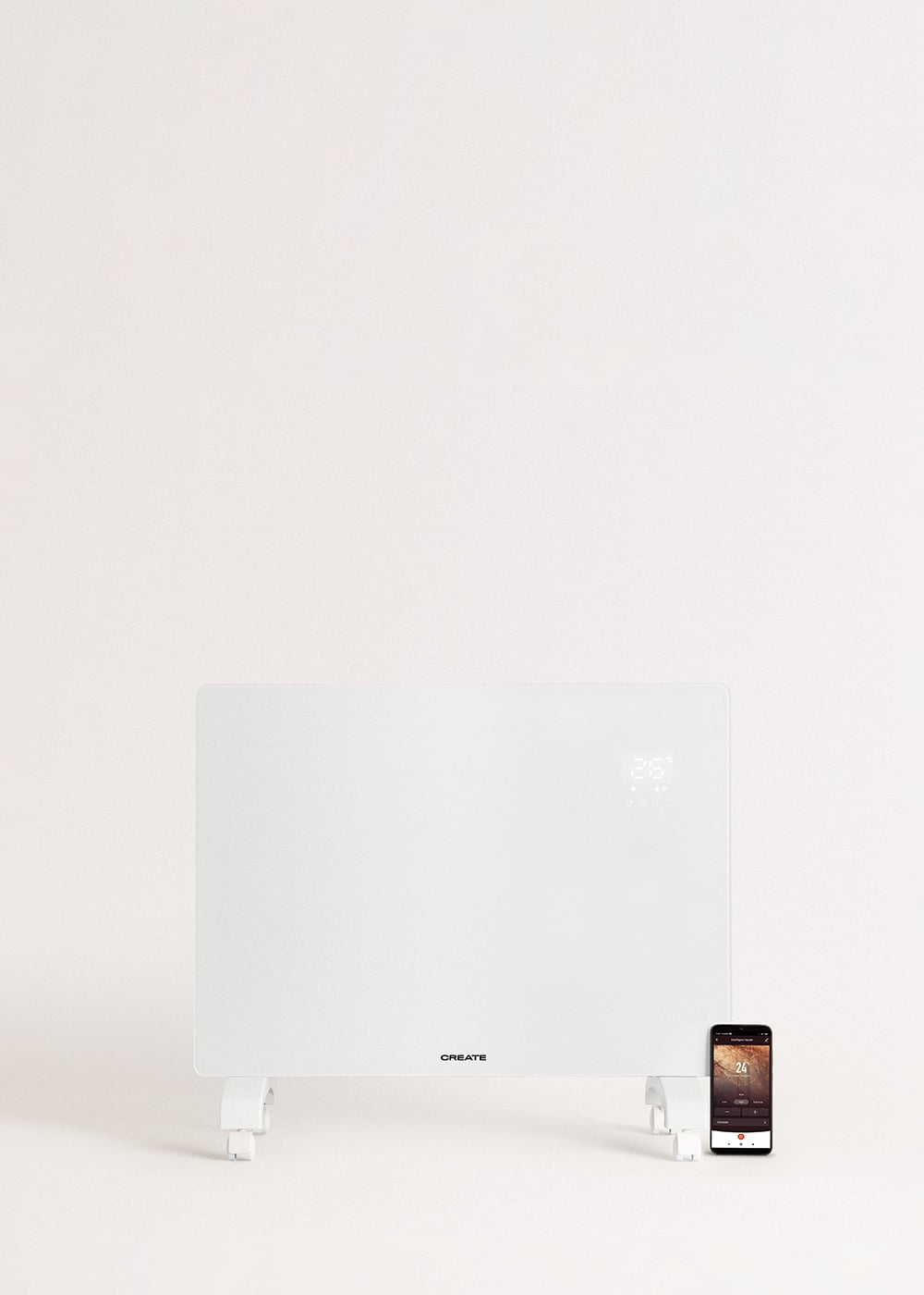 Un radiador eléctrico blanco con pantalla digital y un smartphone cerca.