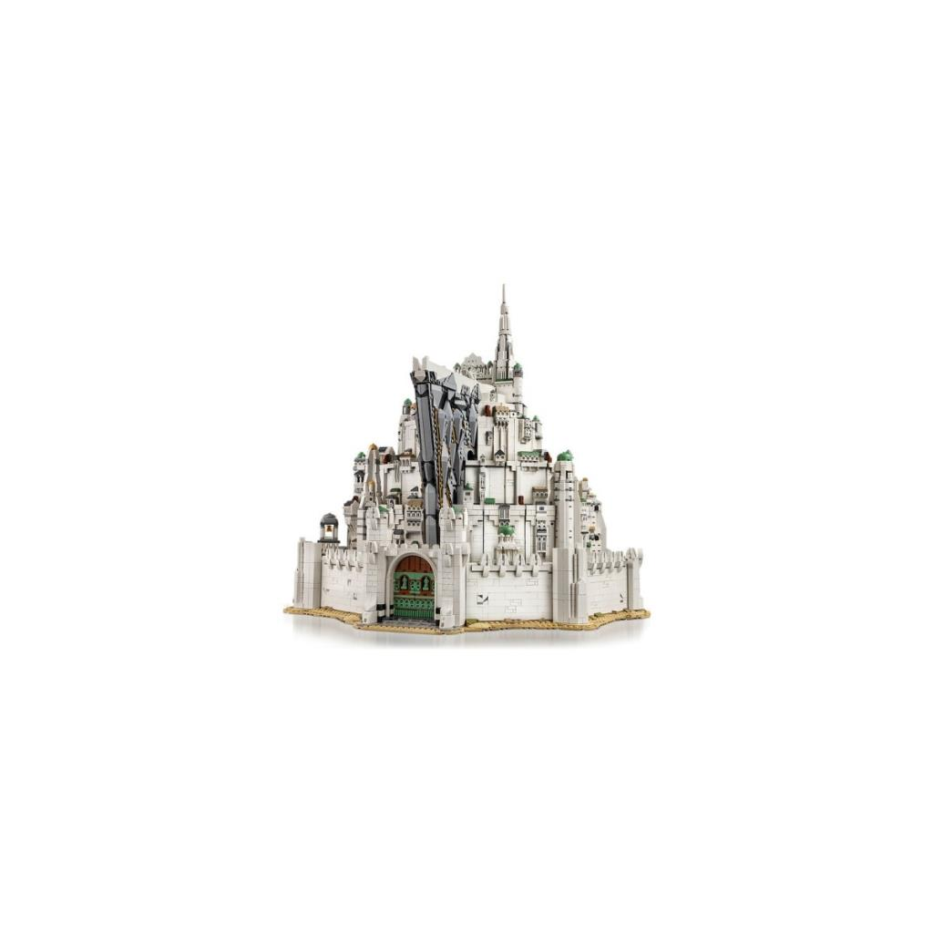 Yeşil kapı ve kuleleri olan beyaz Lego kale modeli.