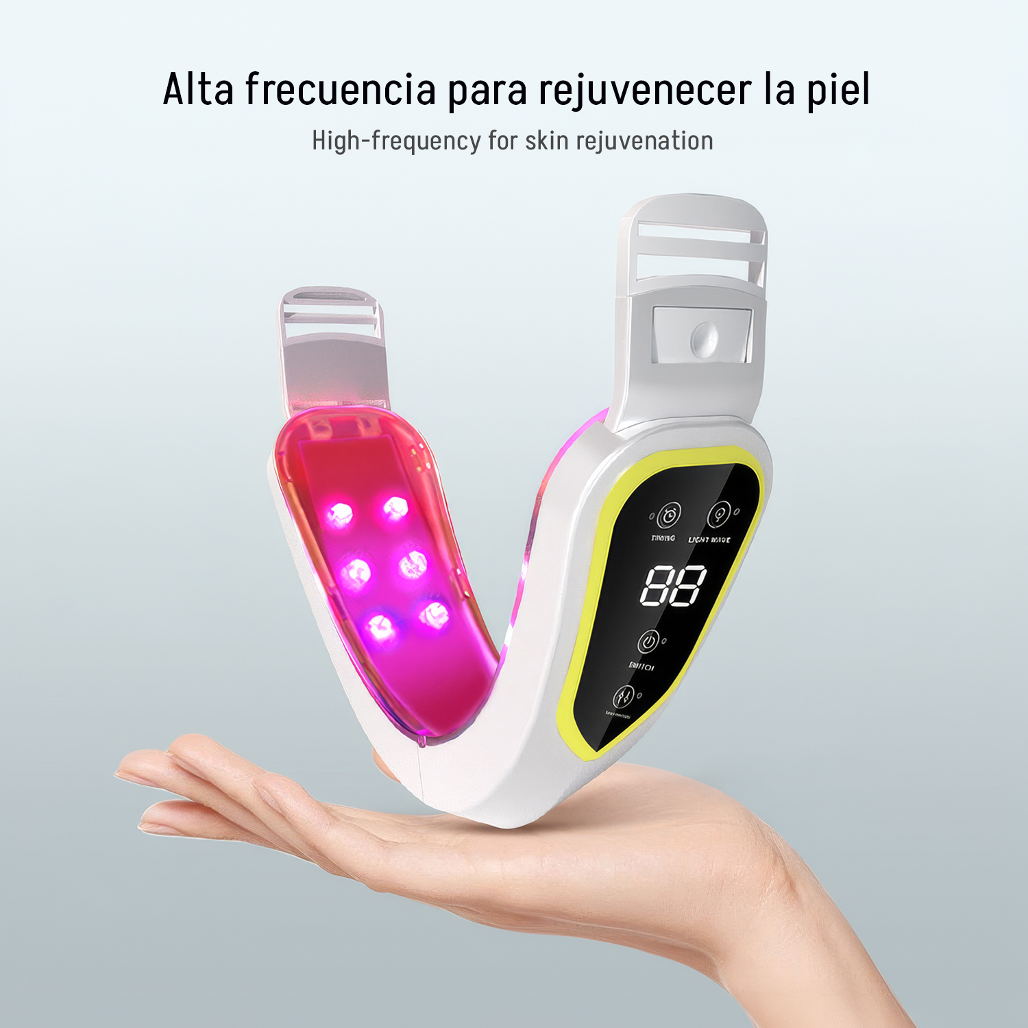 Mano sostiene dispositivo de cuidado facial con luces rojas y pantalla digital.