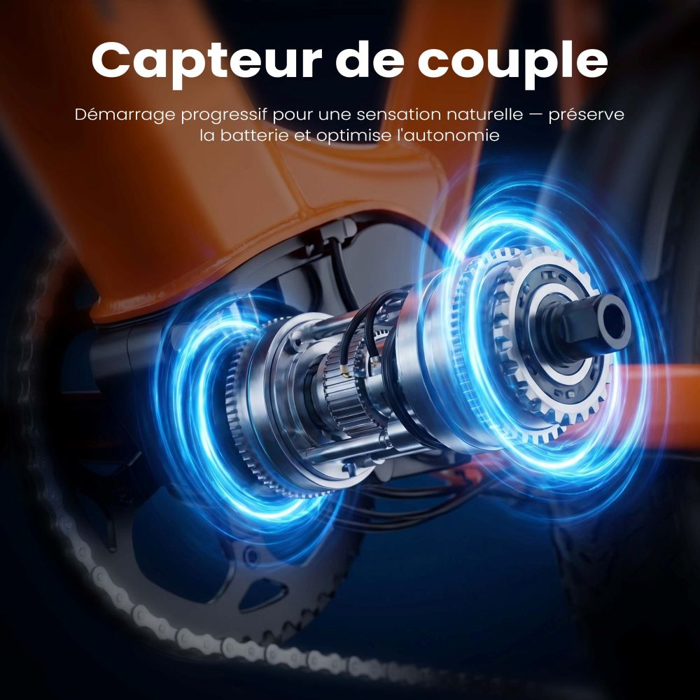 Primer plano de un sensor de par en una bicicleta naranja.