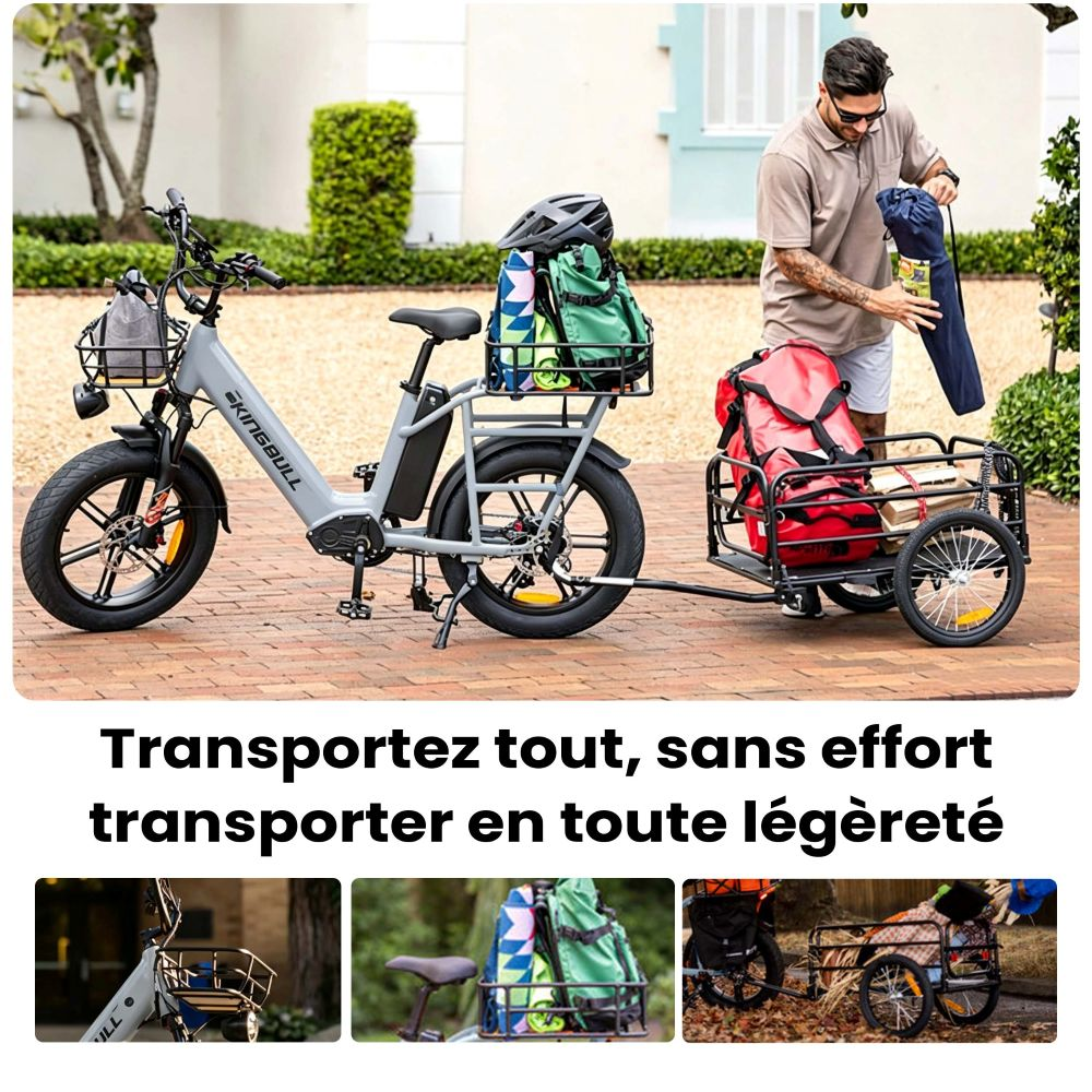 Bicicleta eléctrica gris con remolque cargado de equipaje; hombre guarda tienda azul.