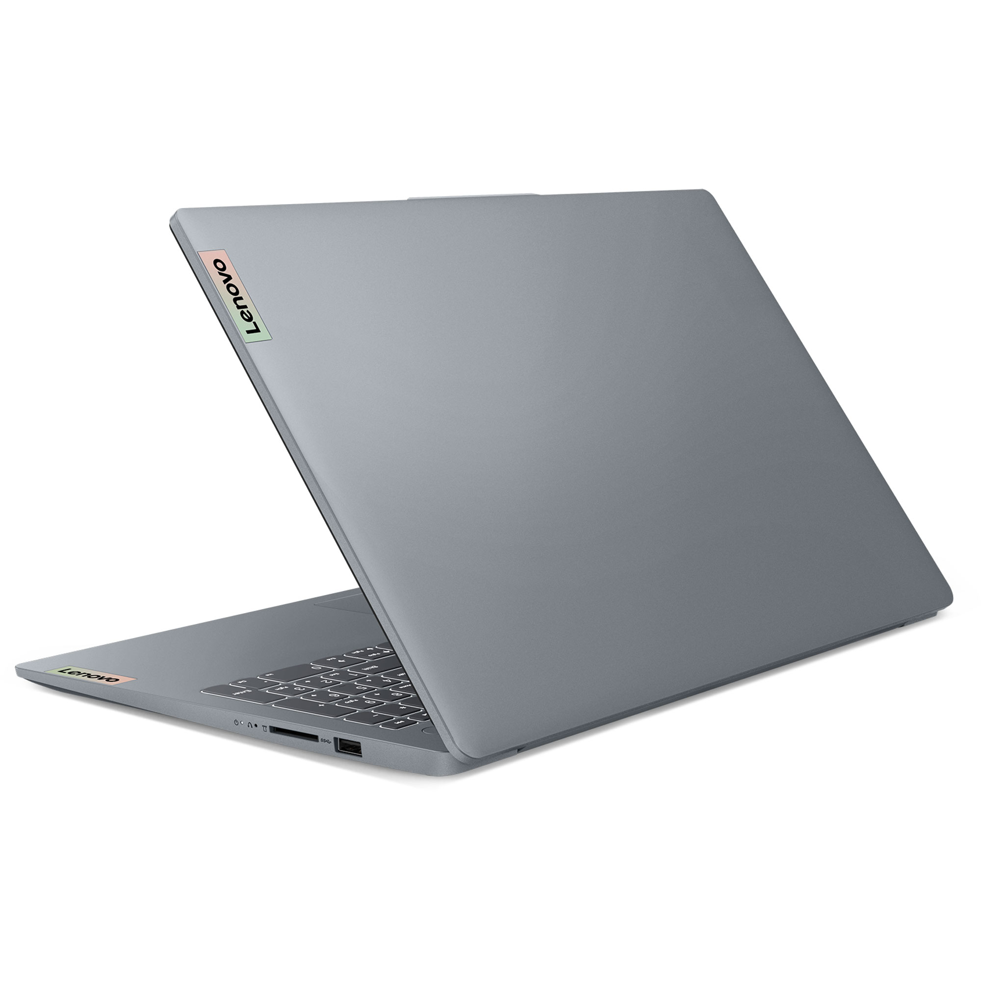 Arkadan aydınlatmalı klavyeli ve bağlantı noktalarına sahip kapalı gri Lenovo dizüstü bilgisayar.