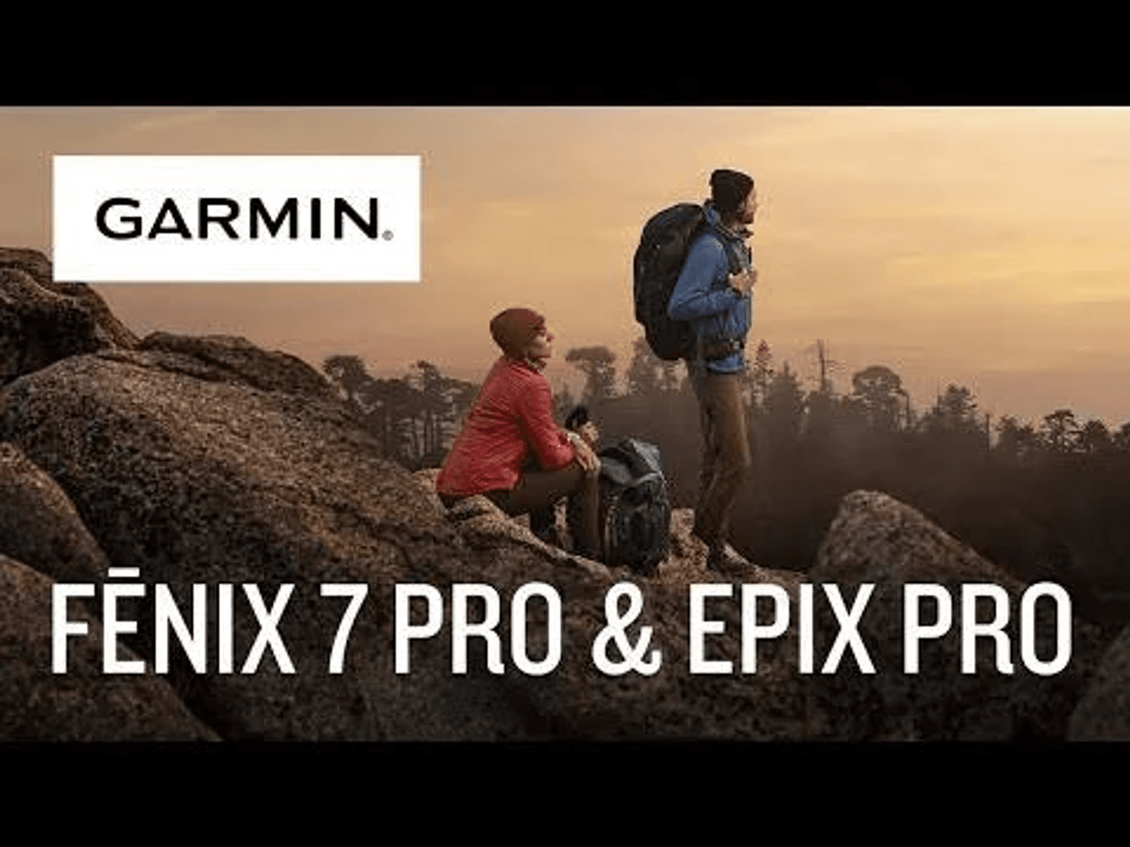 Dos excursionistas con mochilas en rocas, logo de Garmin y texto Fenix 7 Pro & Epix Pro.