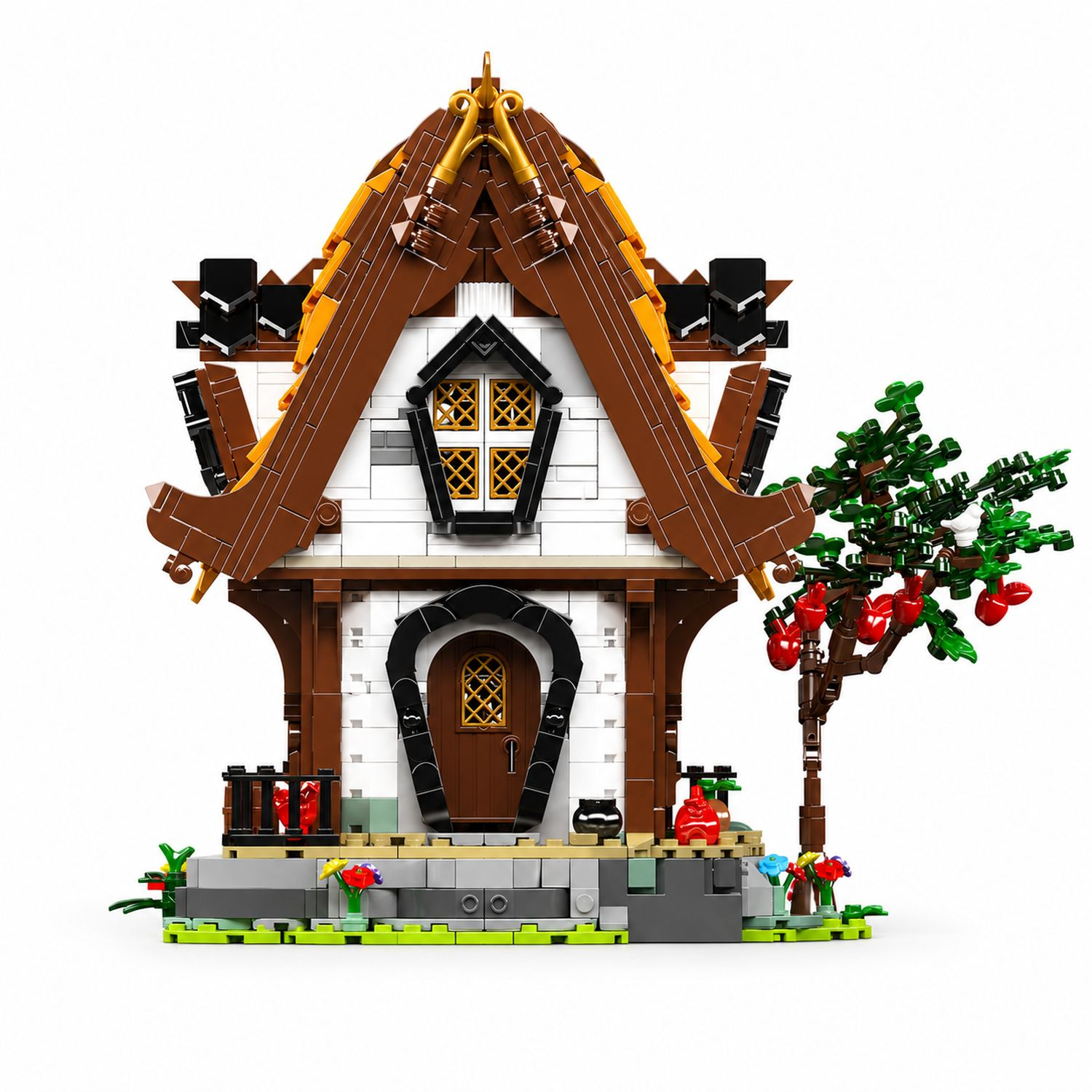 Bajkowy dom z Lego z brązowym dachem, białymi ścianami i jabłonią.