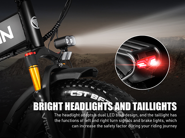 E-bike nera con faro luminoso e fanale posteriore rosso.