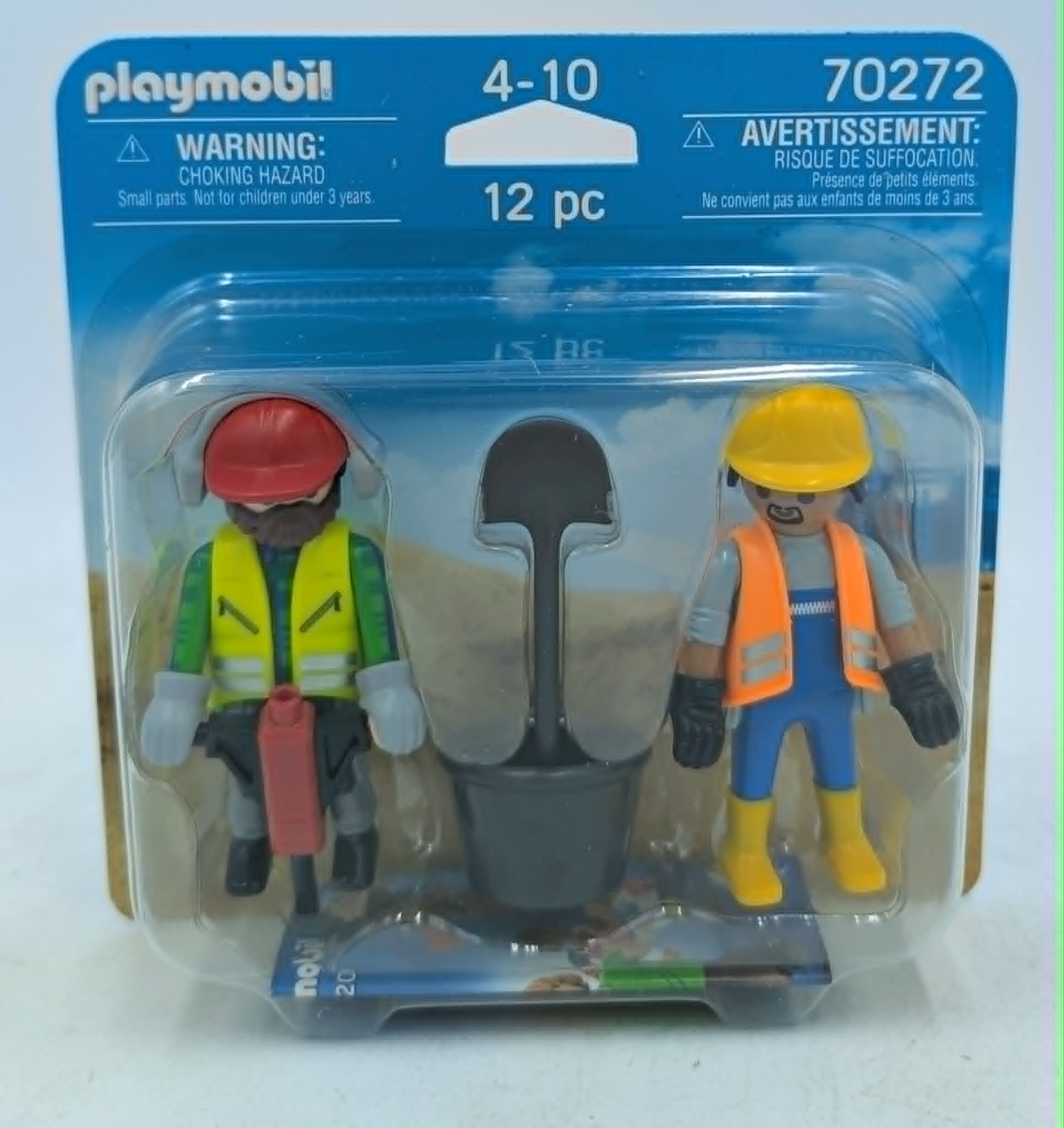 Playmobil-Figuren im Bauarbeiter-Look mit Schaufel und Eimer in Verpackung.
