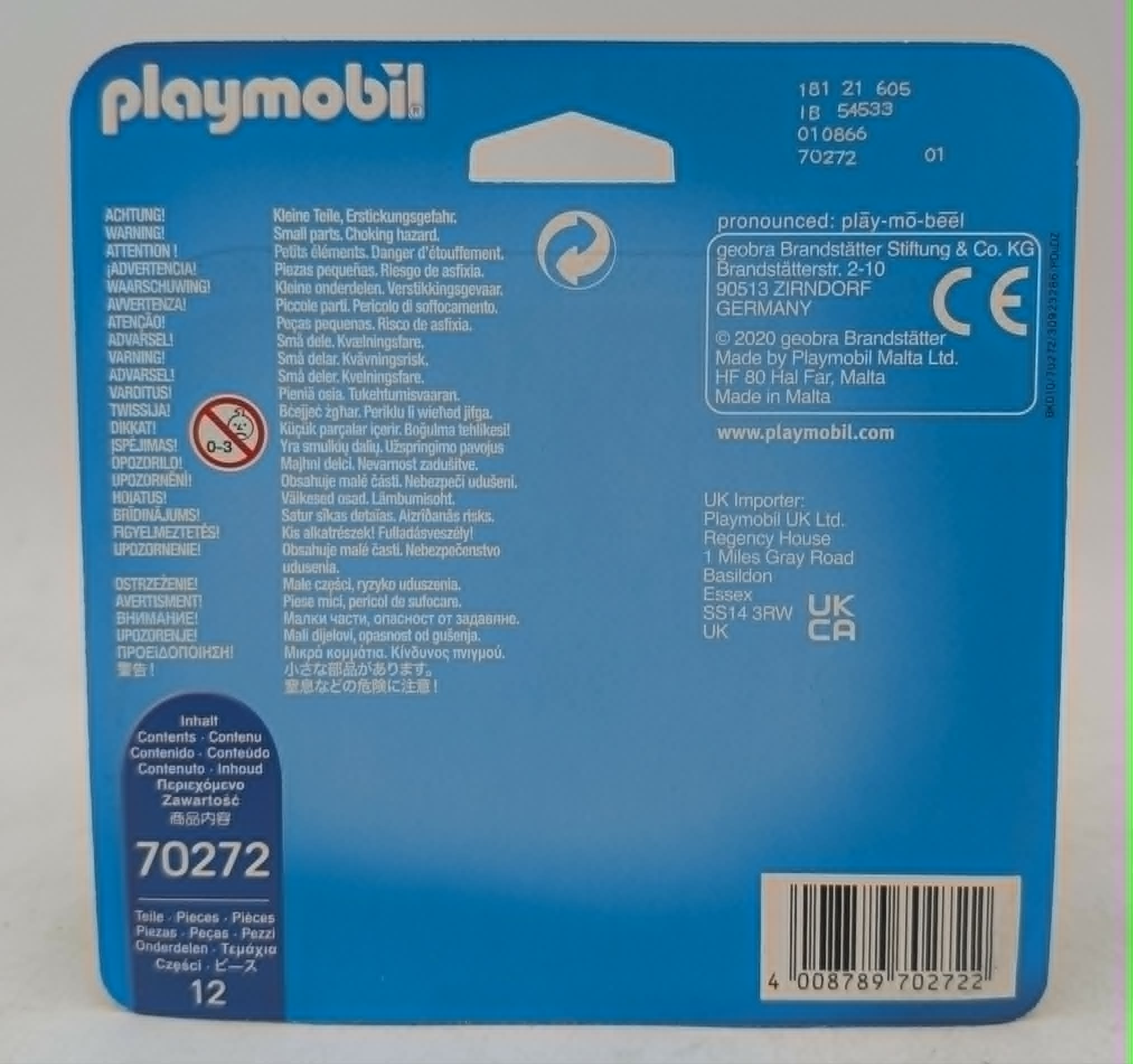 Playmobil-Verpackung mit Warnhinweisen, CE-Zeichen, Herstellerangaben und Barcode.