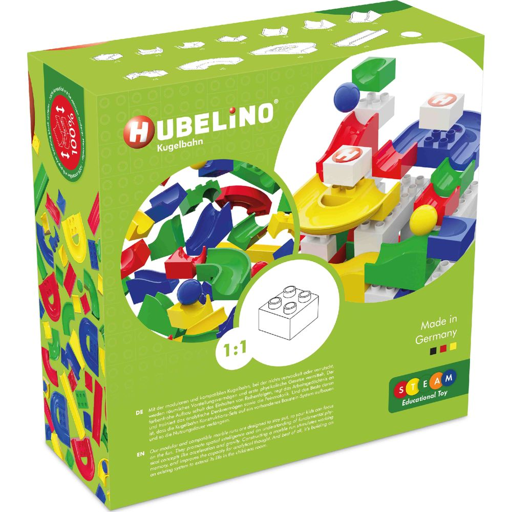 Emballage d'un jouet de circuit de billes Hubelino avec des blocs et des pistes colorés.