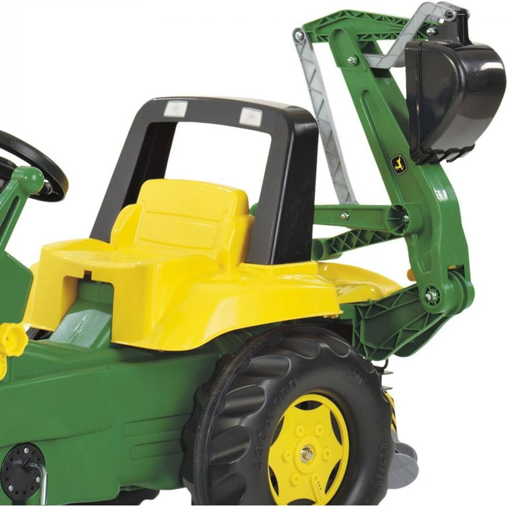 Ein gelber und grüner Spielzeugtraktor mit Lader und Kabine.