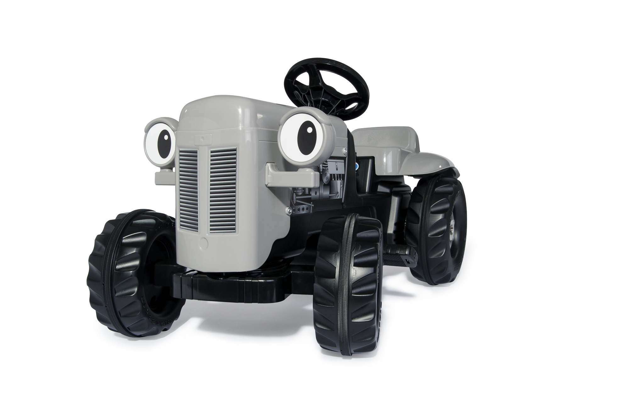 Ein grauer Spielzeugtraktor mit großen schwarzen Rädern und Augen.