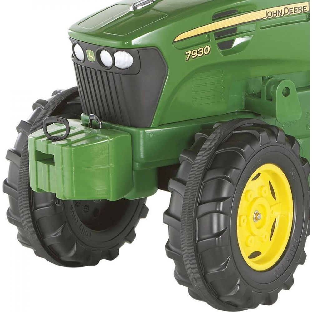 Trattore giocattolo John Deere verde con cerchi gialli e pneumatici neri.