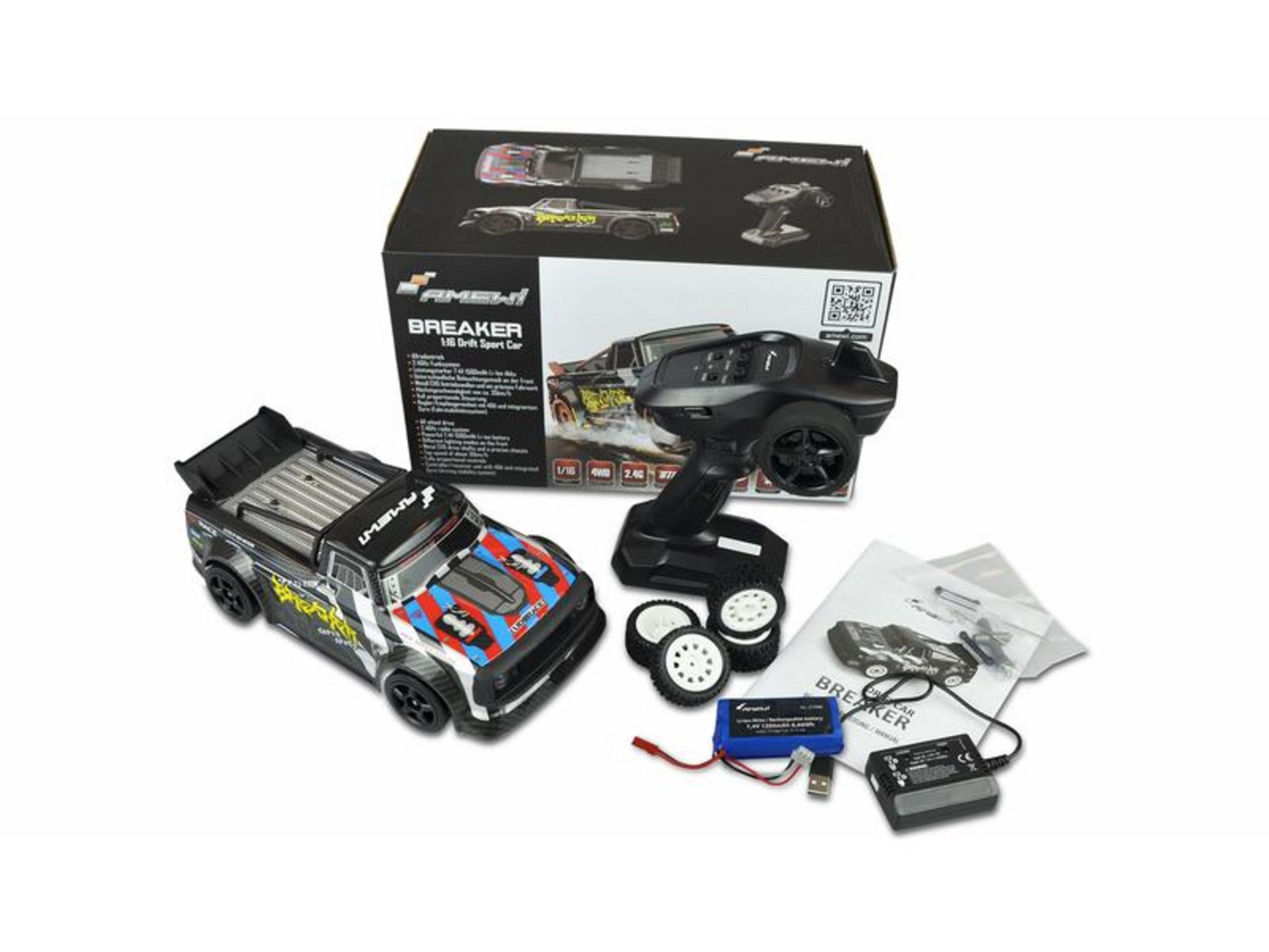 Ein RC-Driftsportwagen mit Fernbedienung, Ersatzrädern und Zubehör.