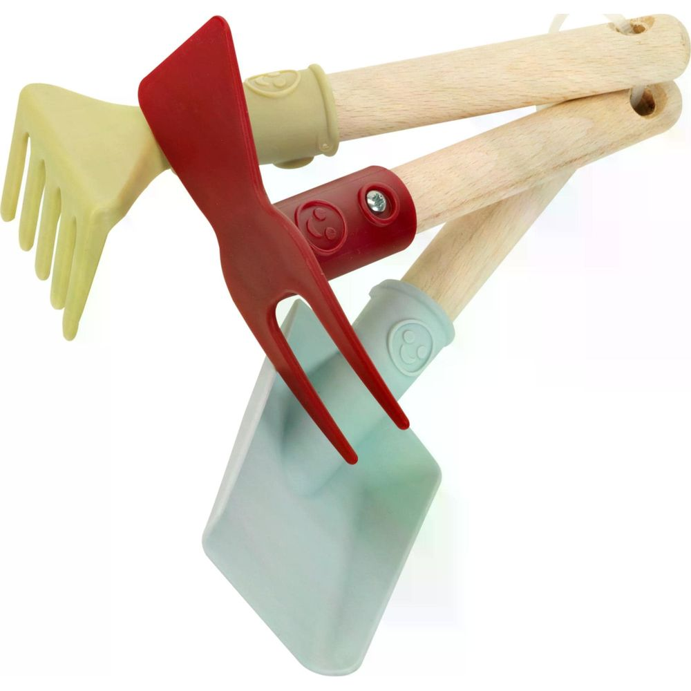 Gartengeräte mit Holzgriffen: Schaufel, Harke und Gabel in Pastellfarben.